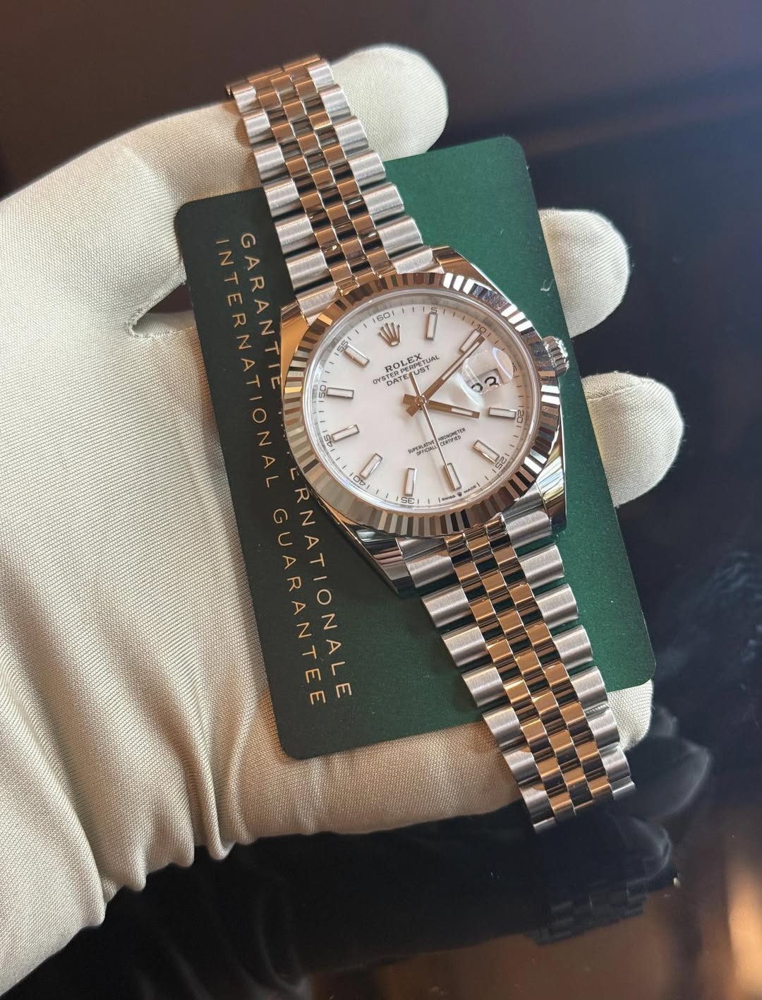 May be an image of wrist watch and text that says 'S0 0r% EETИA PERPETUM EX みん OLEX orste pA 分PE発PE DATE 0 Su NT INTERNAT GARANTI GUARANTEE ANTE RNATIONALE ALE'