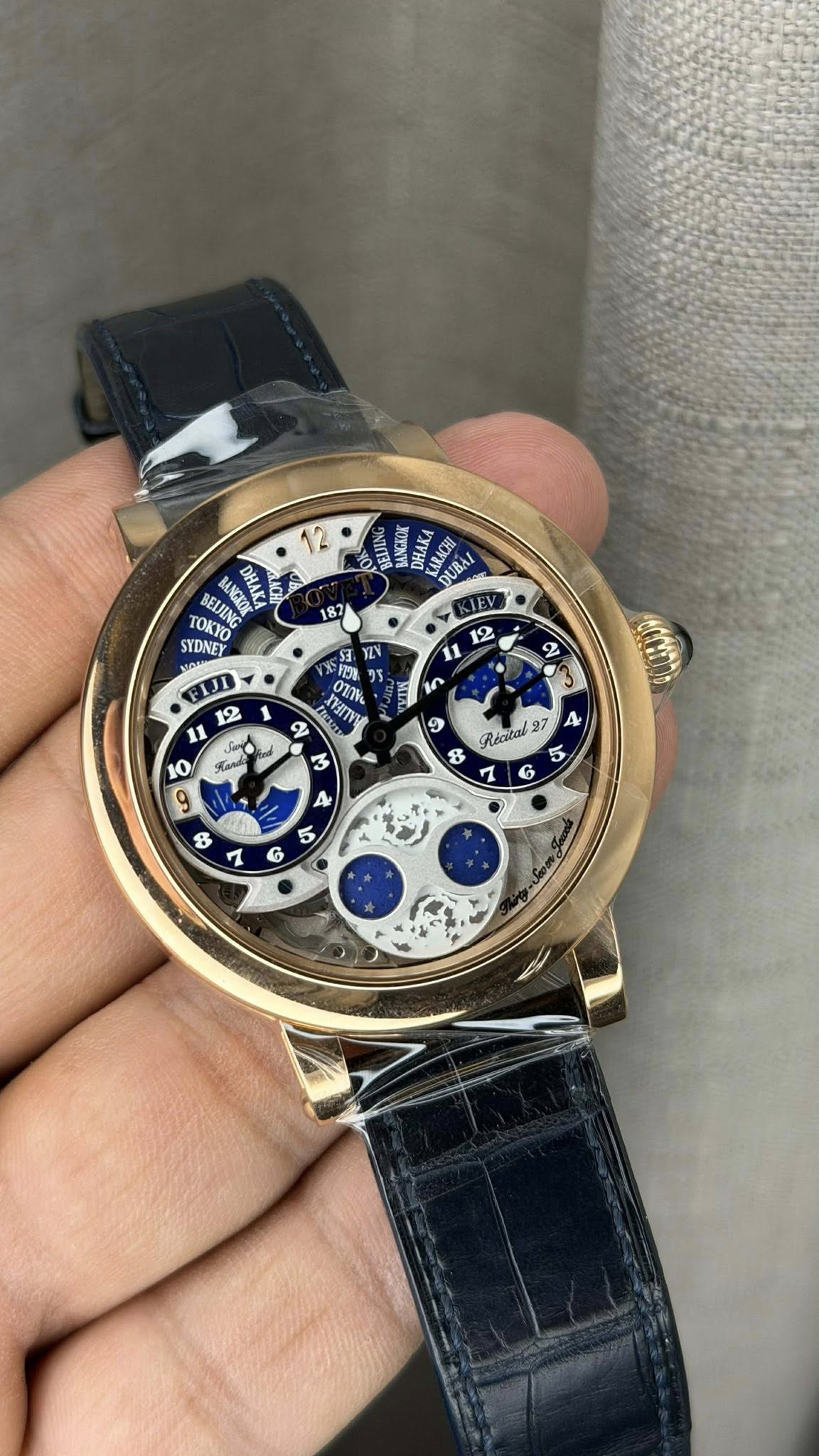 May be an image of wrist watch and text