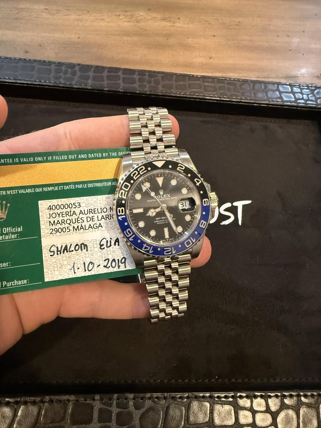 May be an image of wrist watch and text that says 'NTEE IS VALID ONLY IF FILLED OUT AND DATED HE OFFIC TIE N'EST VALABLE REMPLIE DATEE PARU DISTRIBUTE 2 4 OLEX ΕPλρΚΣ Фy6Лbb…