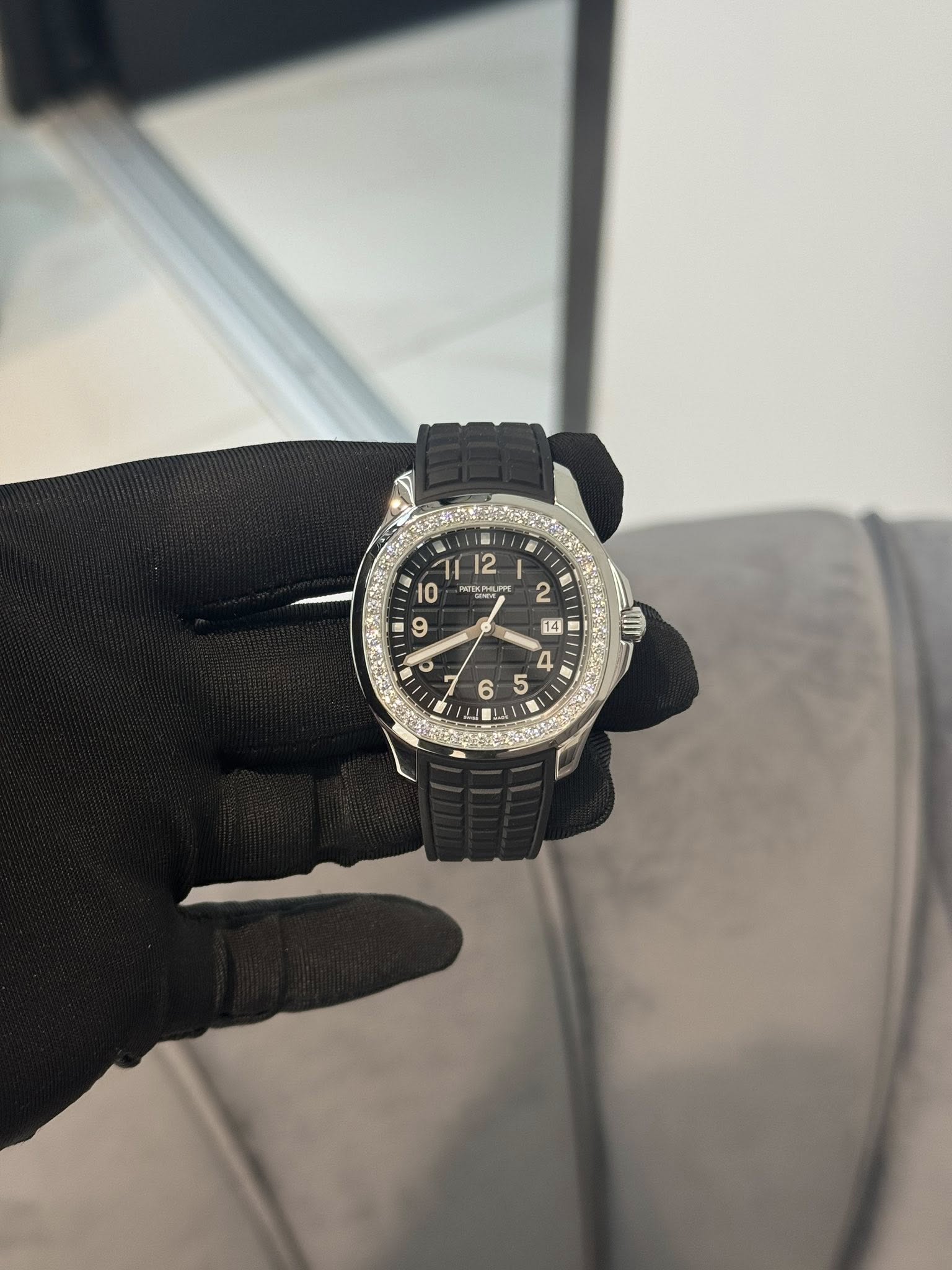 May be an image of wrist watch and text