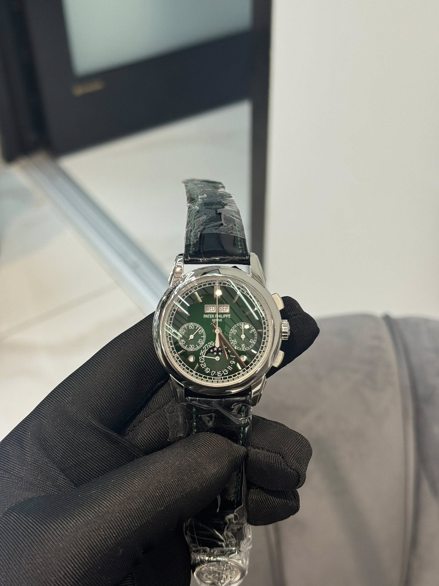 May be an image of wrist watch and text