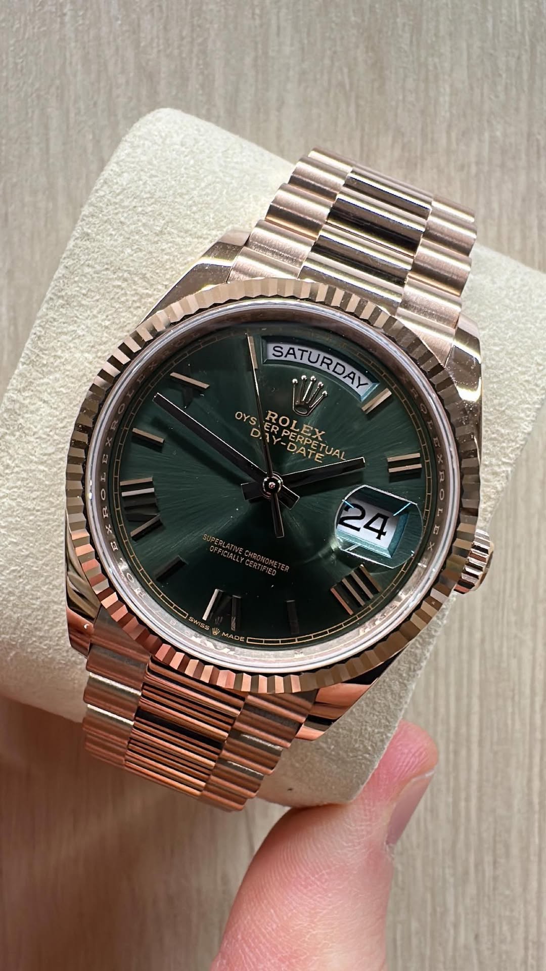May be an image of wrist watch and text