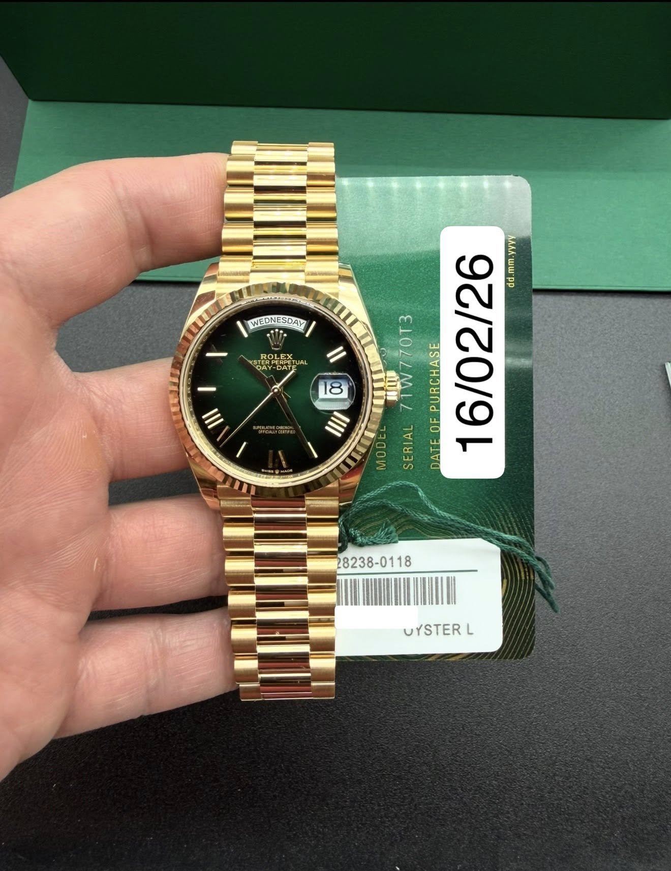 May be an image of wrist watch and text that says 'WEDNESDAY ROLE ROLEX OA CAY- あッ ФA 18 YYYY dd. 71W770T3 MOD SERIAL DATEDEPURCHASE PURCHASE 16/02/26 mm.yyyy .mm nm. III II1…