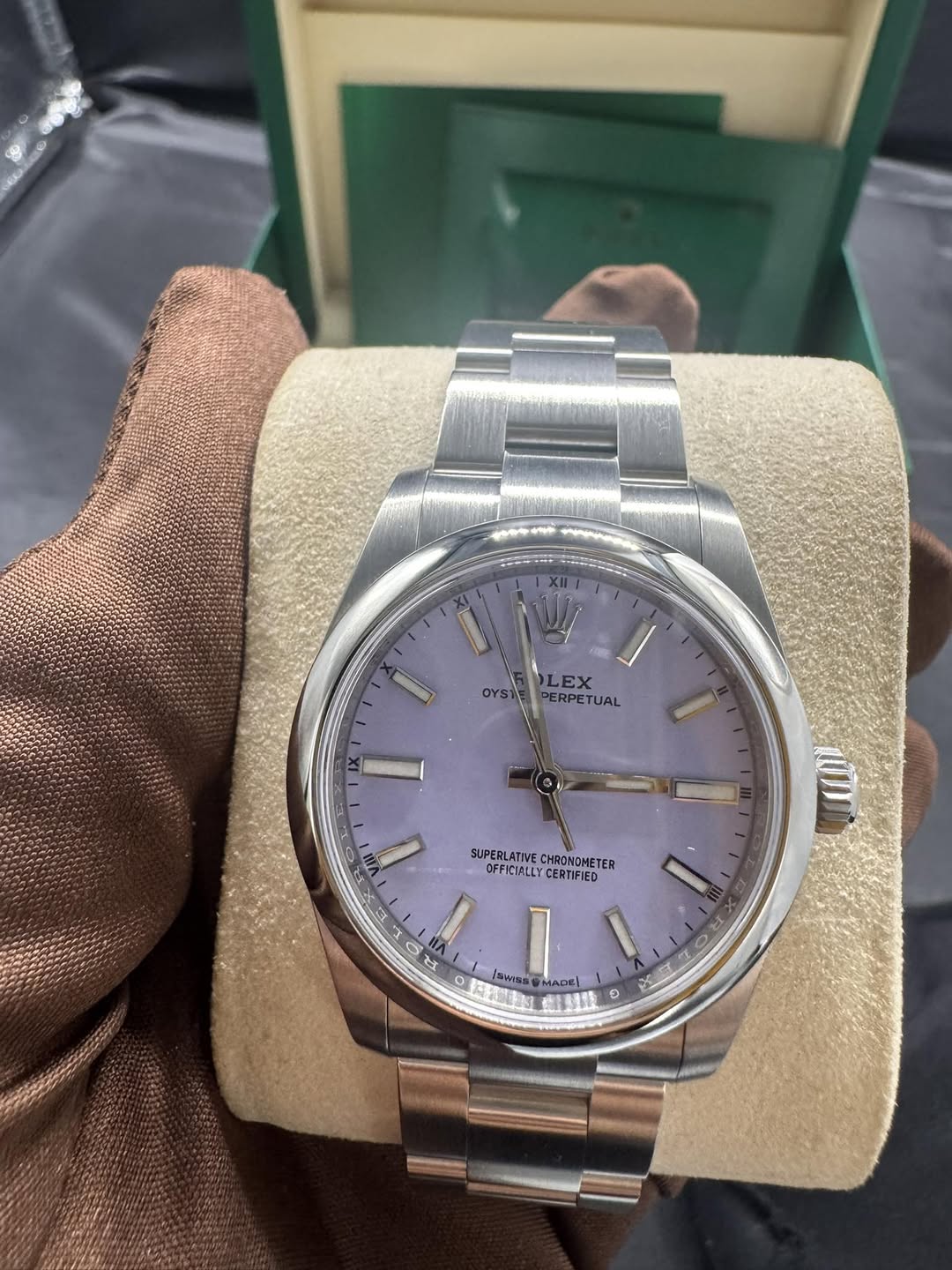 May be an image of wrist watch and text