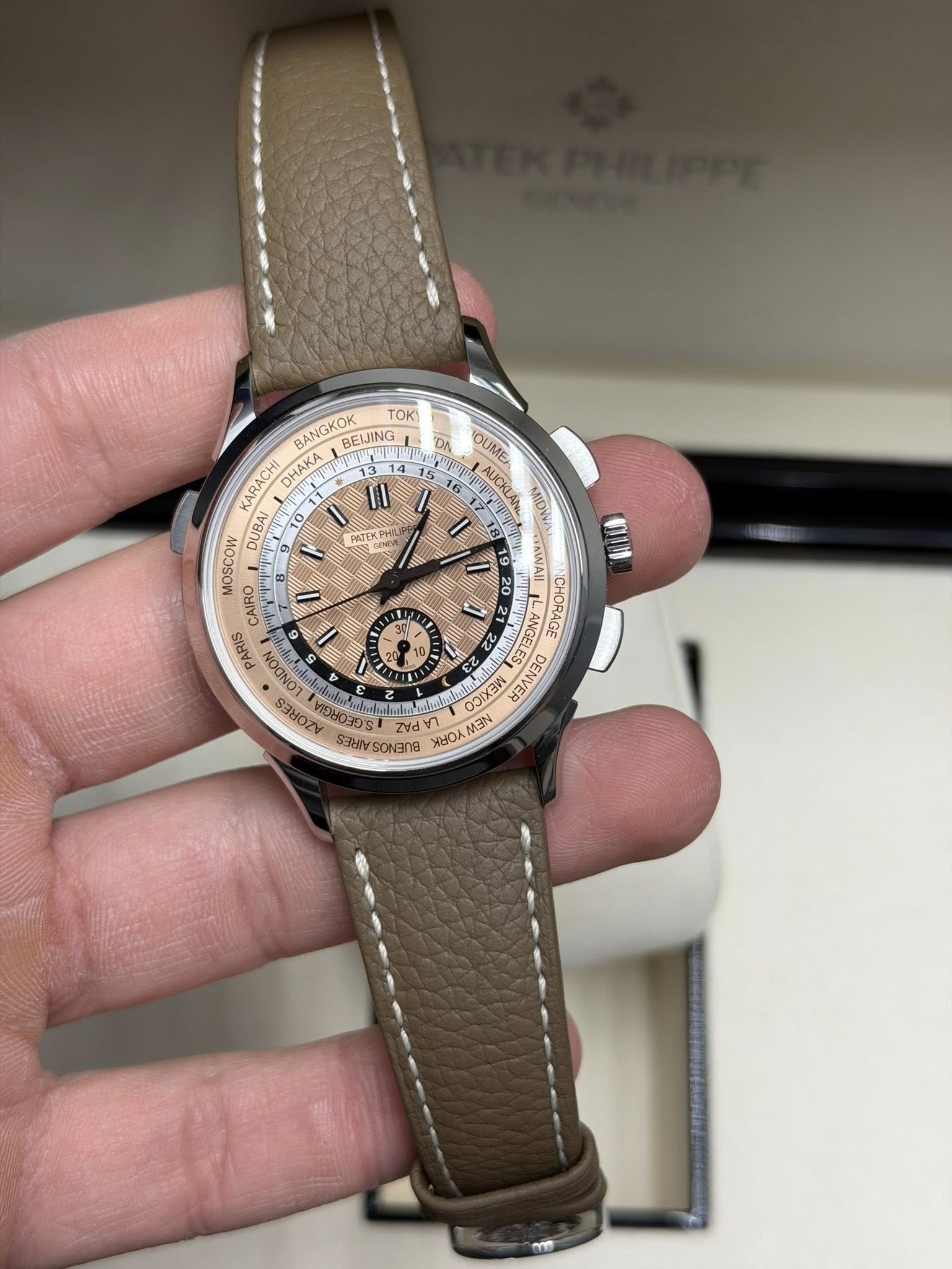 May be an image of wrist watch and text