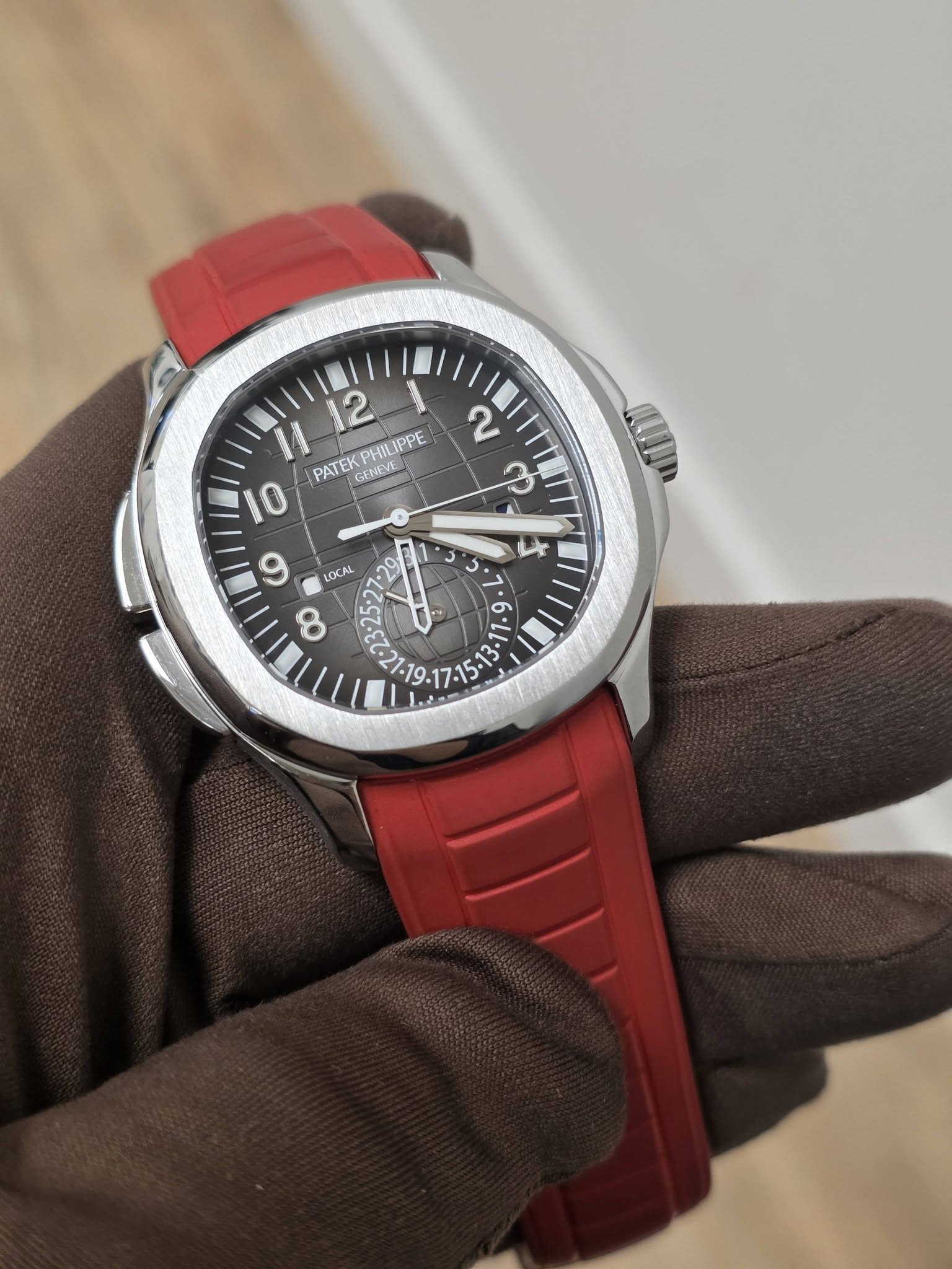 May be an image of wrist watch and text