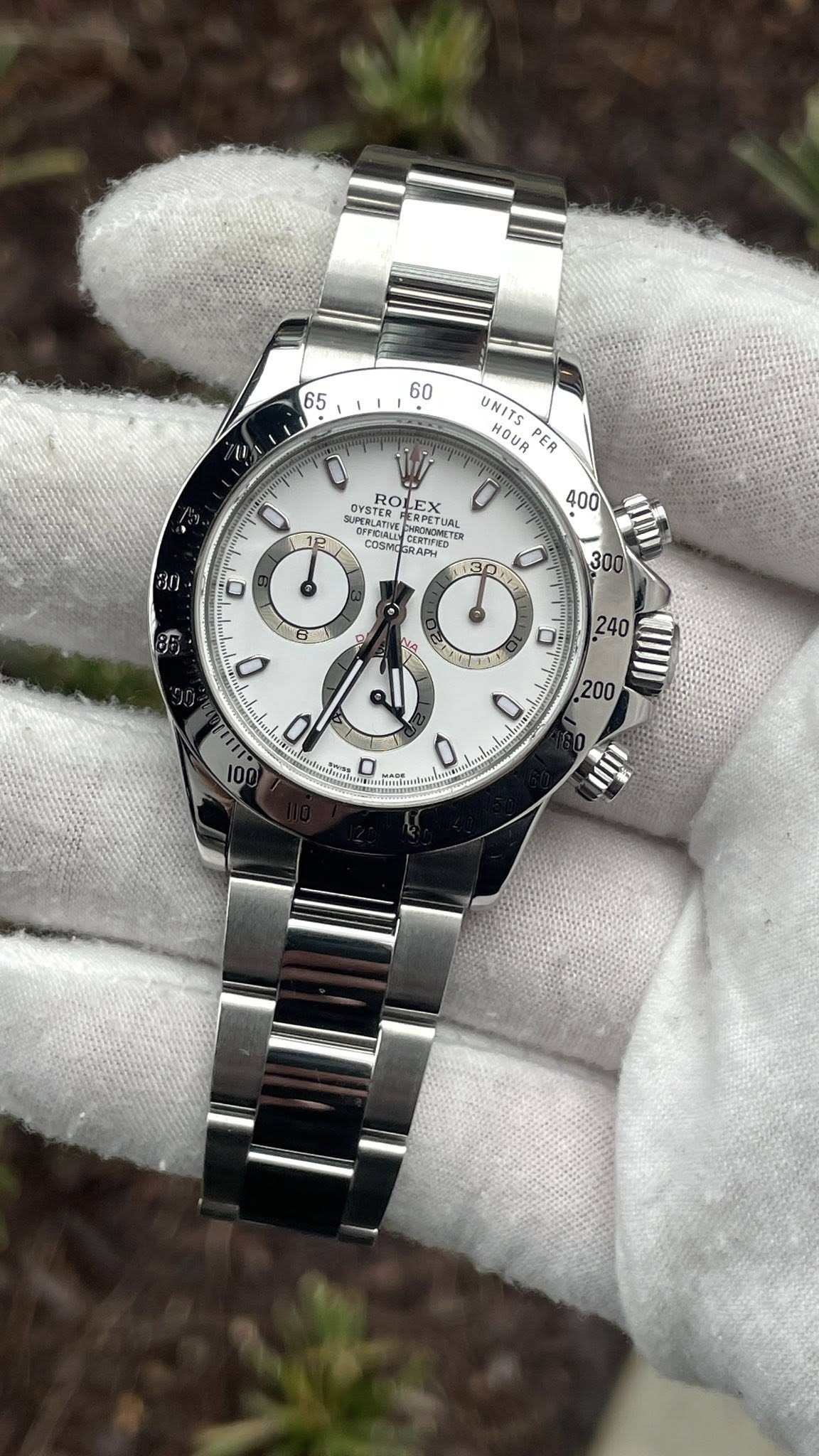 May be an image of wrist watch and text