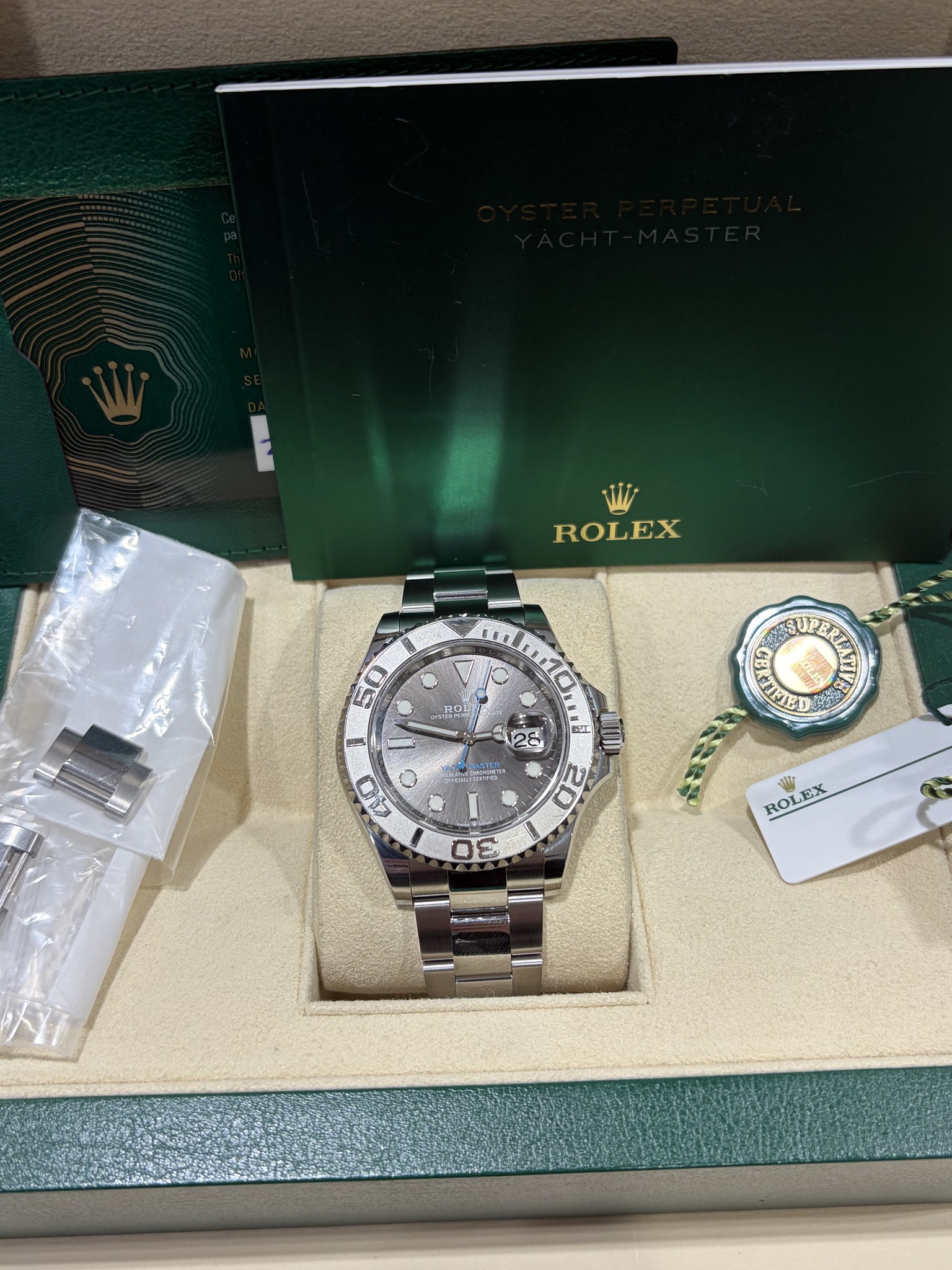 May be an image of wrist watch and text