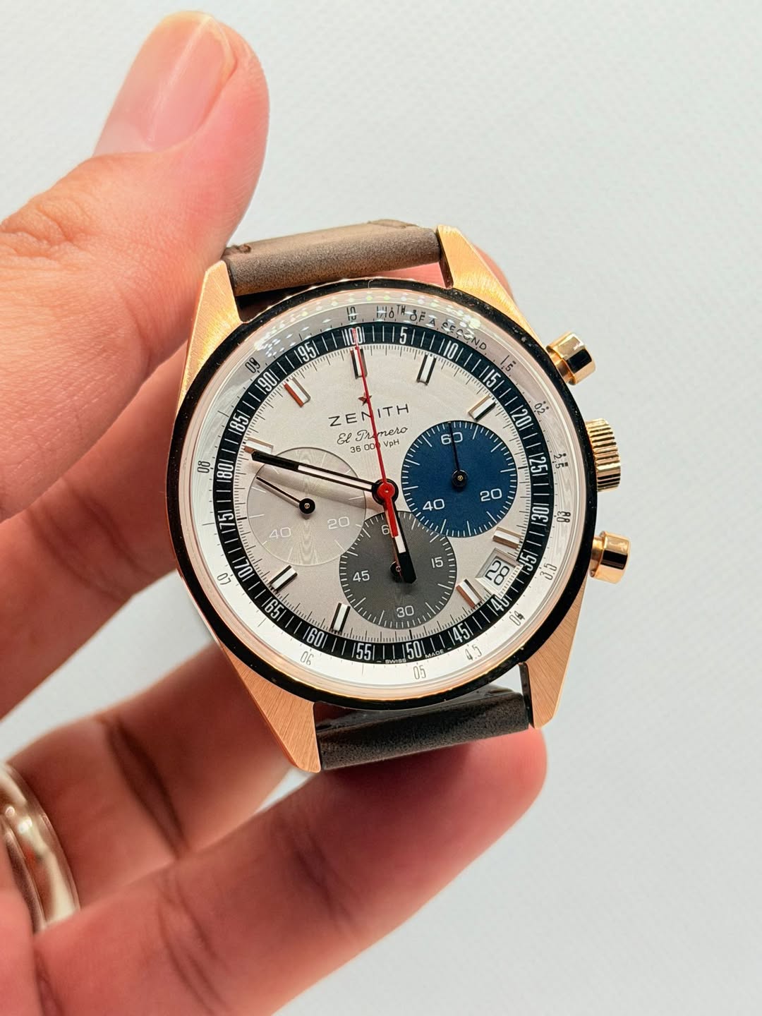 May be an image of wrist watch and text