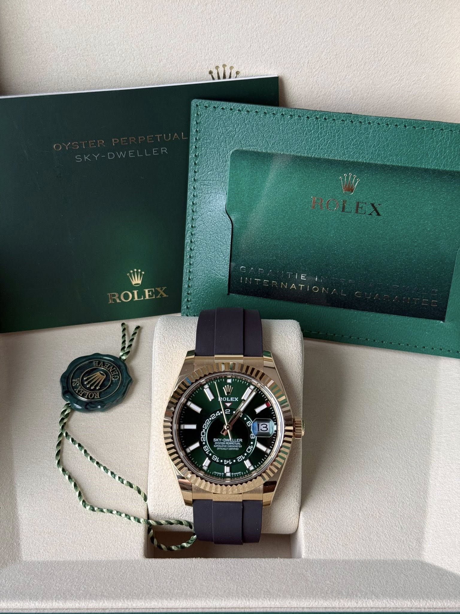 May be an image of wrist watch and text