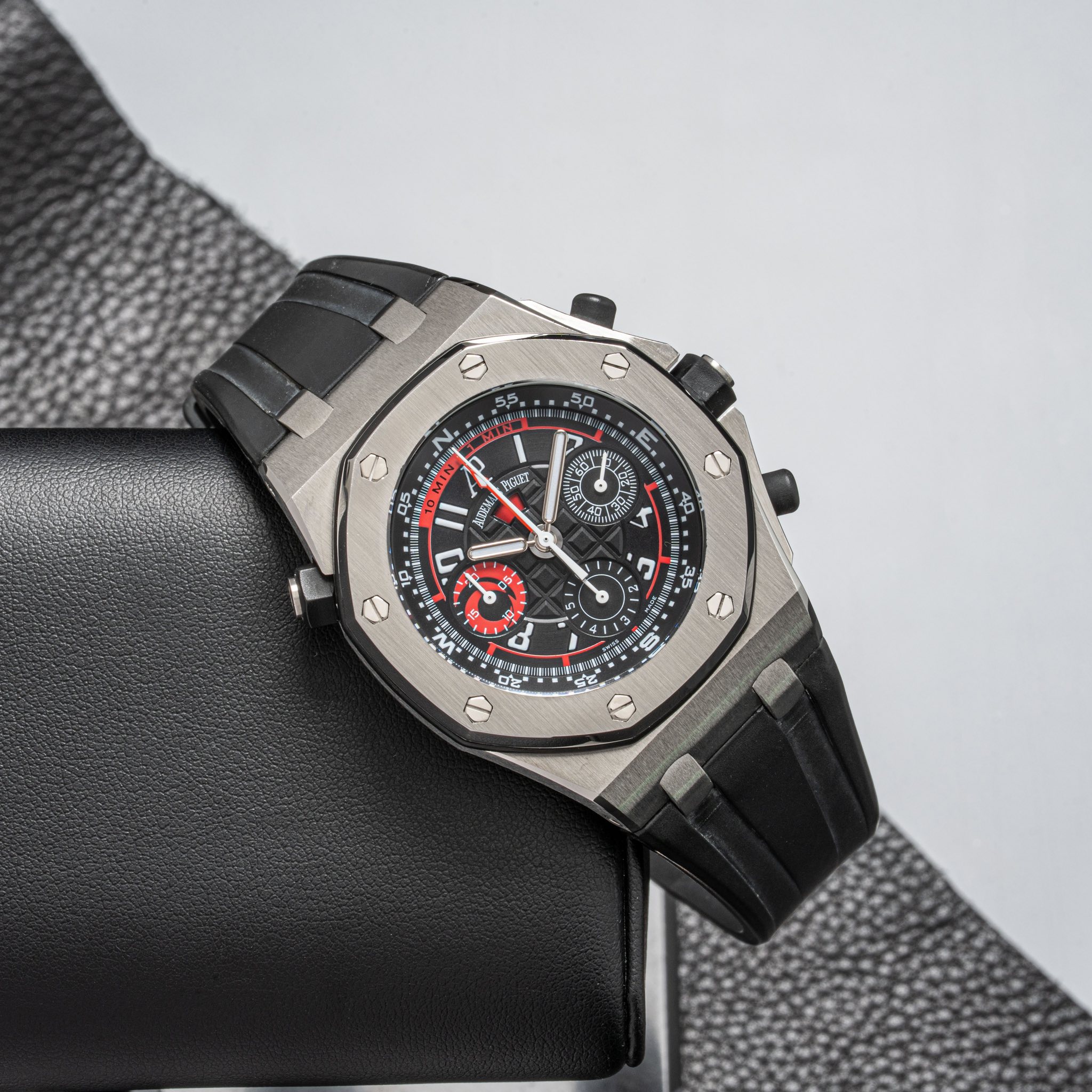 May be an image of wrist watch and text