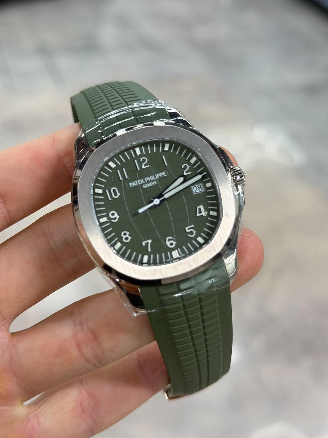 May be an image of wrist watch and text that says ' PATEK PHIL LIPPE GENEVE و 0ه 7 4 5 6'
