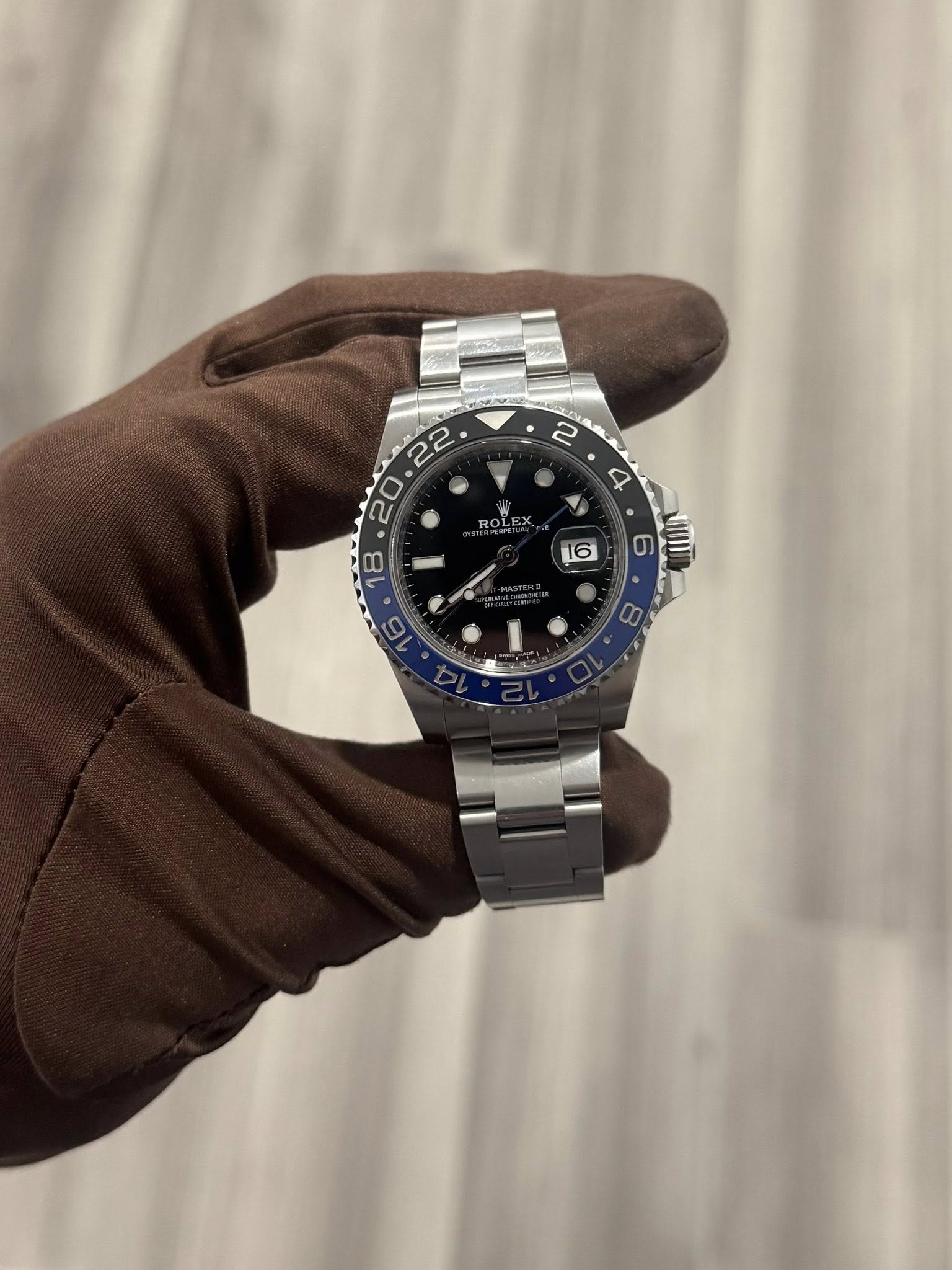 May be an image of wrist watch and text