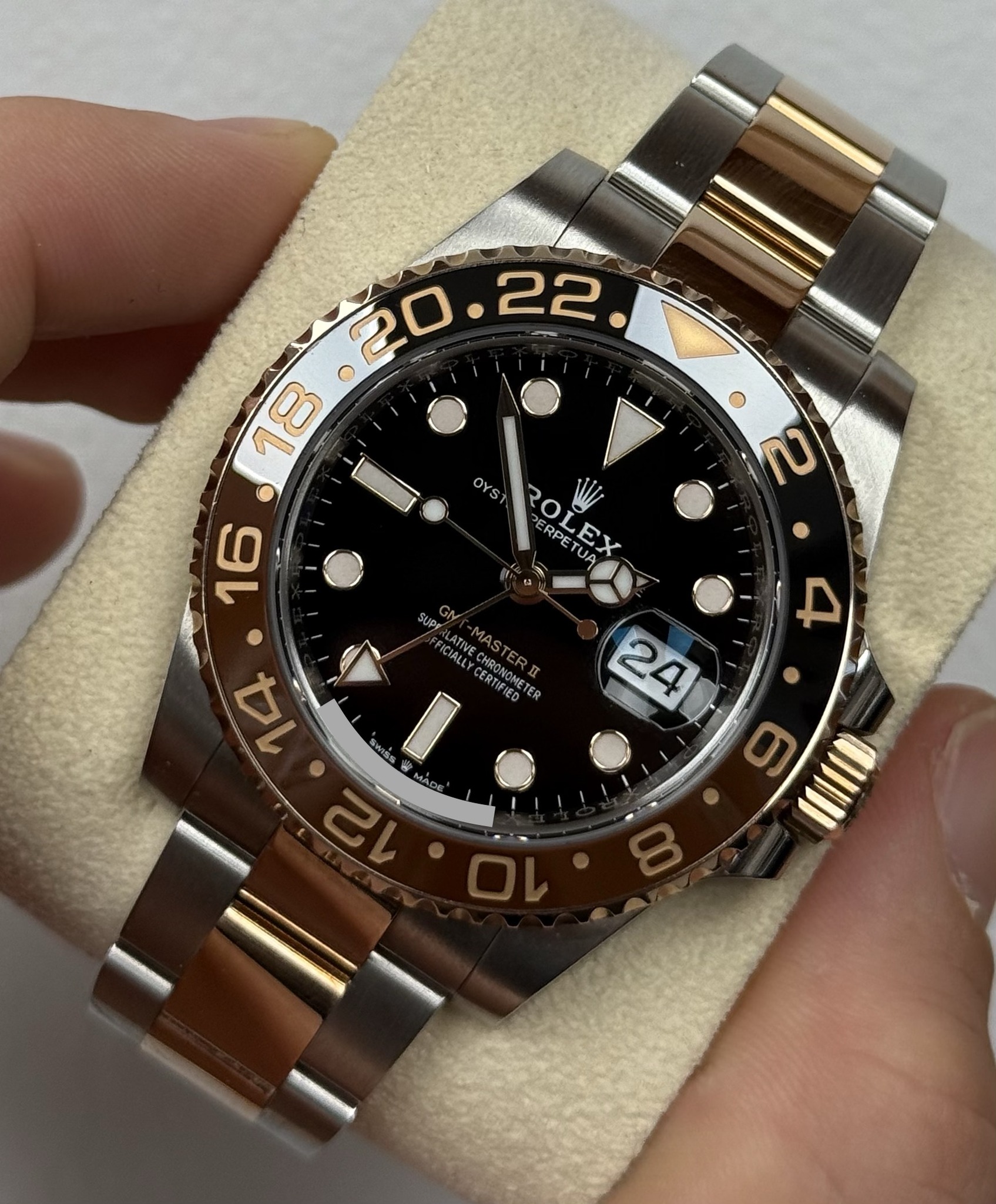 May be an image of wrist watch and text