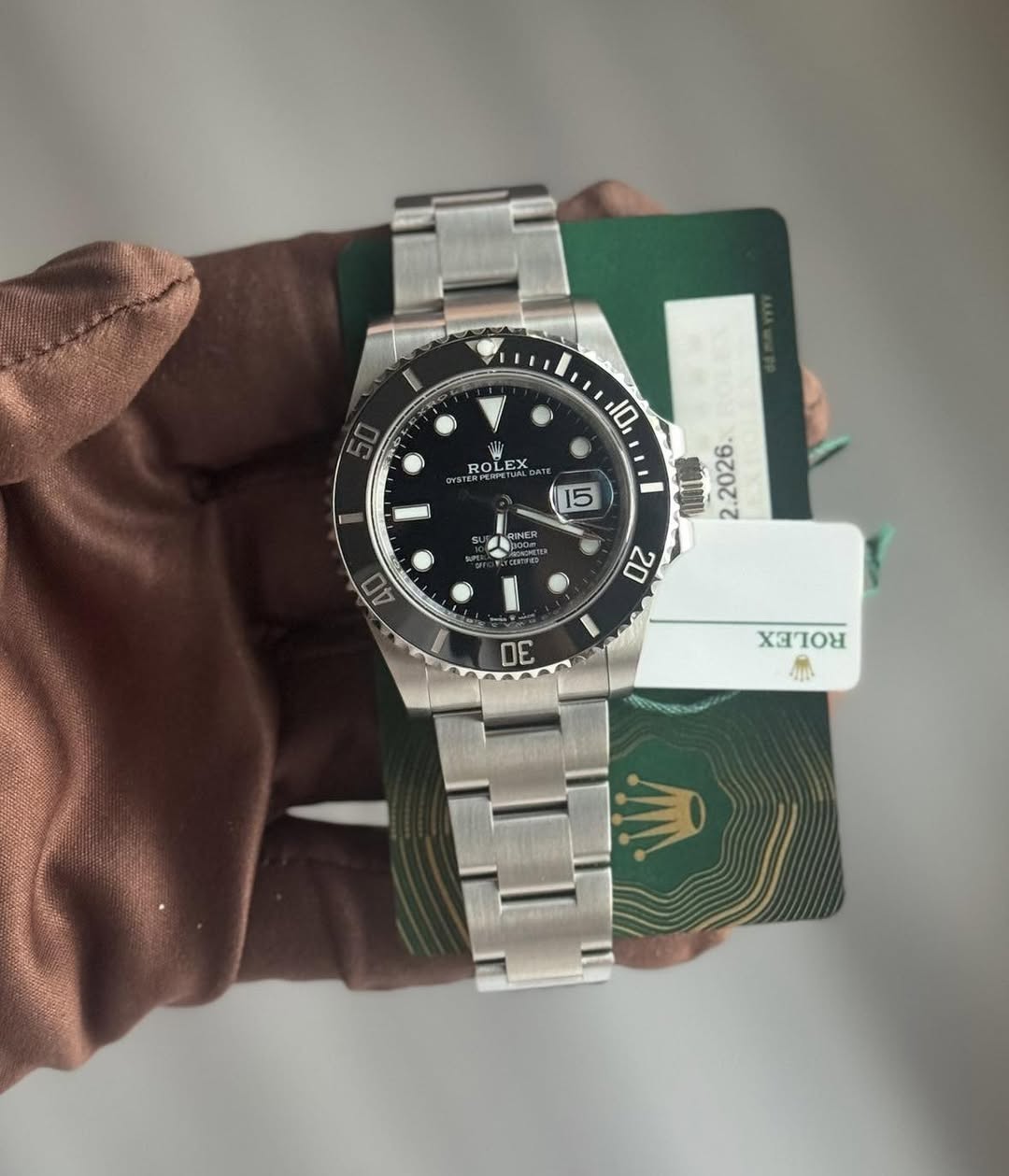 May be an image of wrist watch and text