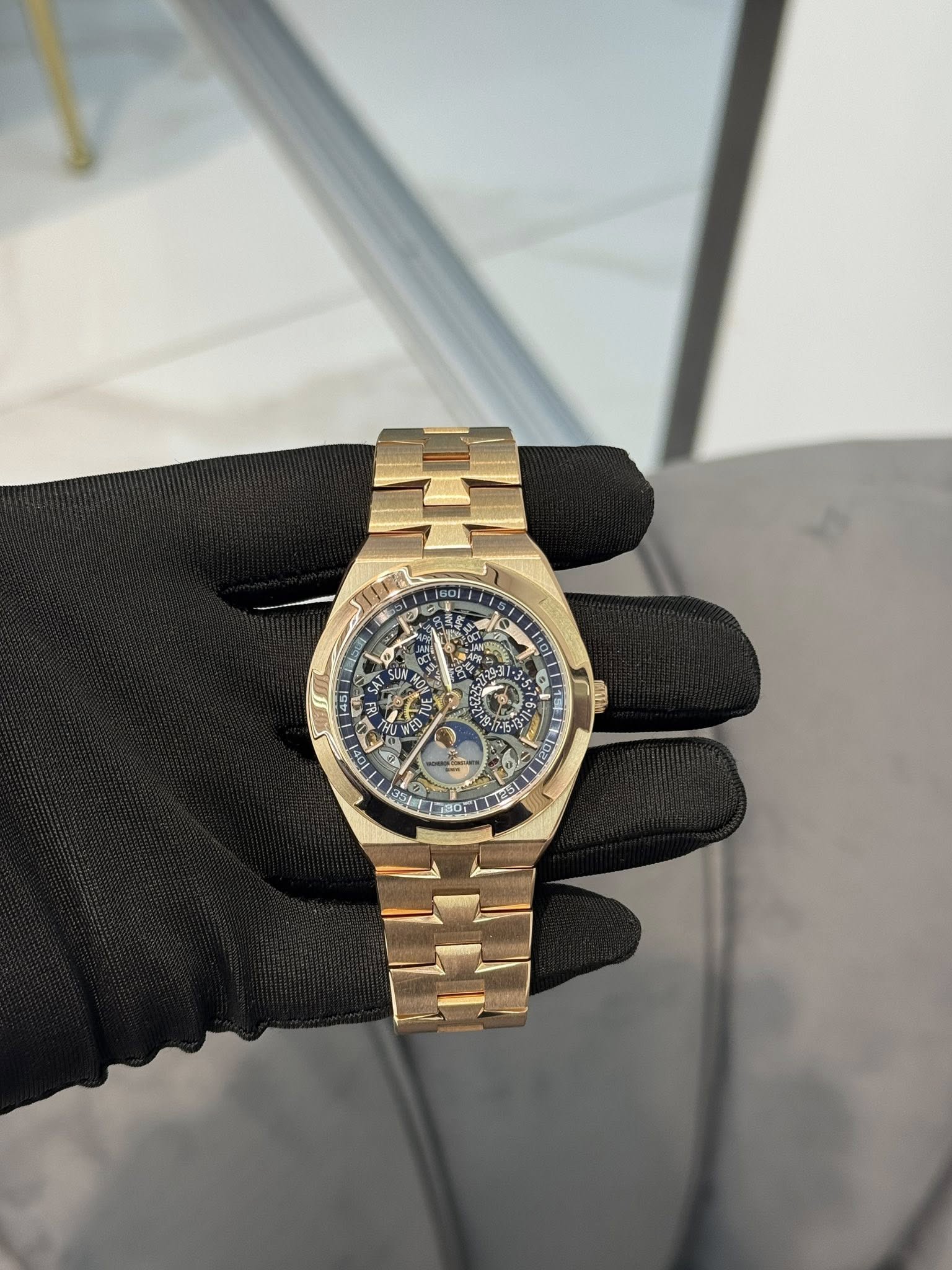 May be an image of wrist watch and text