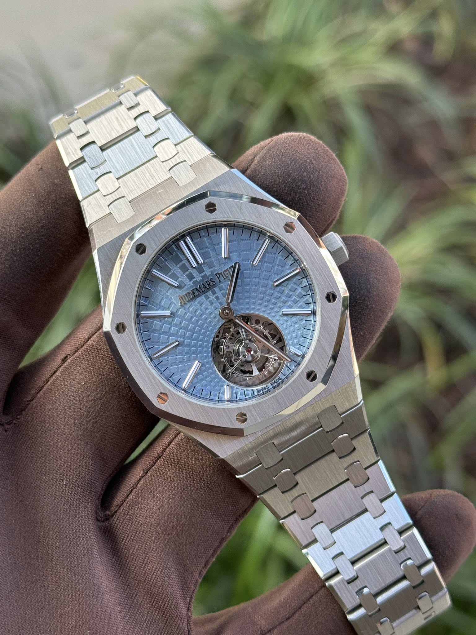 May be an image of wrist watch and text