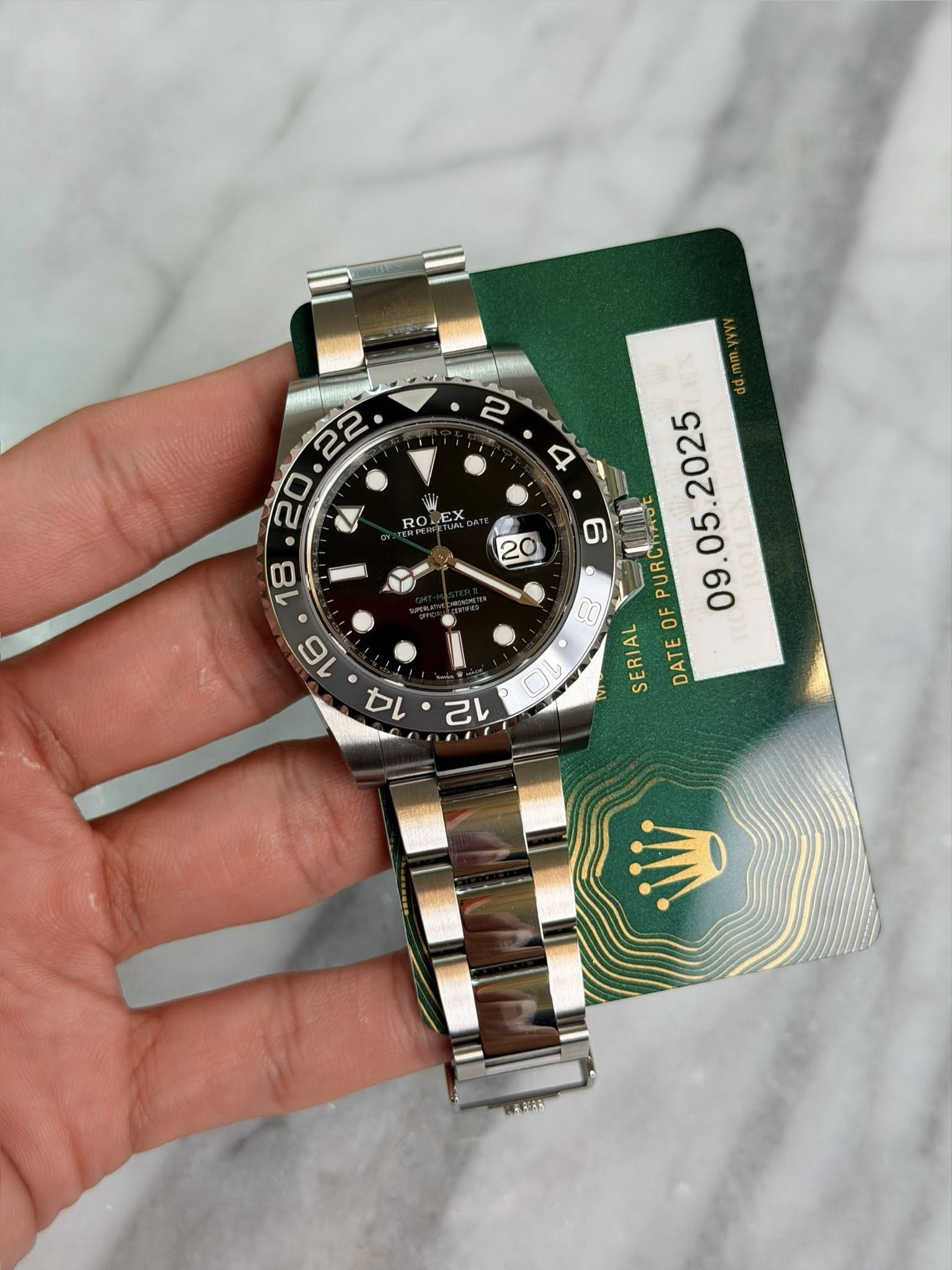 May be an image of wrist watch and text that says '2 RO ROLEX DATEOFPURCIROE URCTIAO OF SERIAL DATE a ح'
