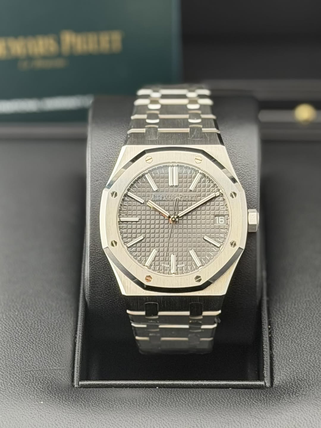 May be an image of wrist watch and text