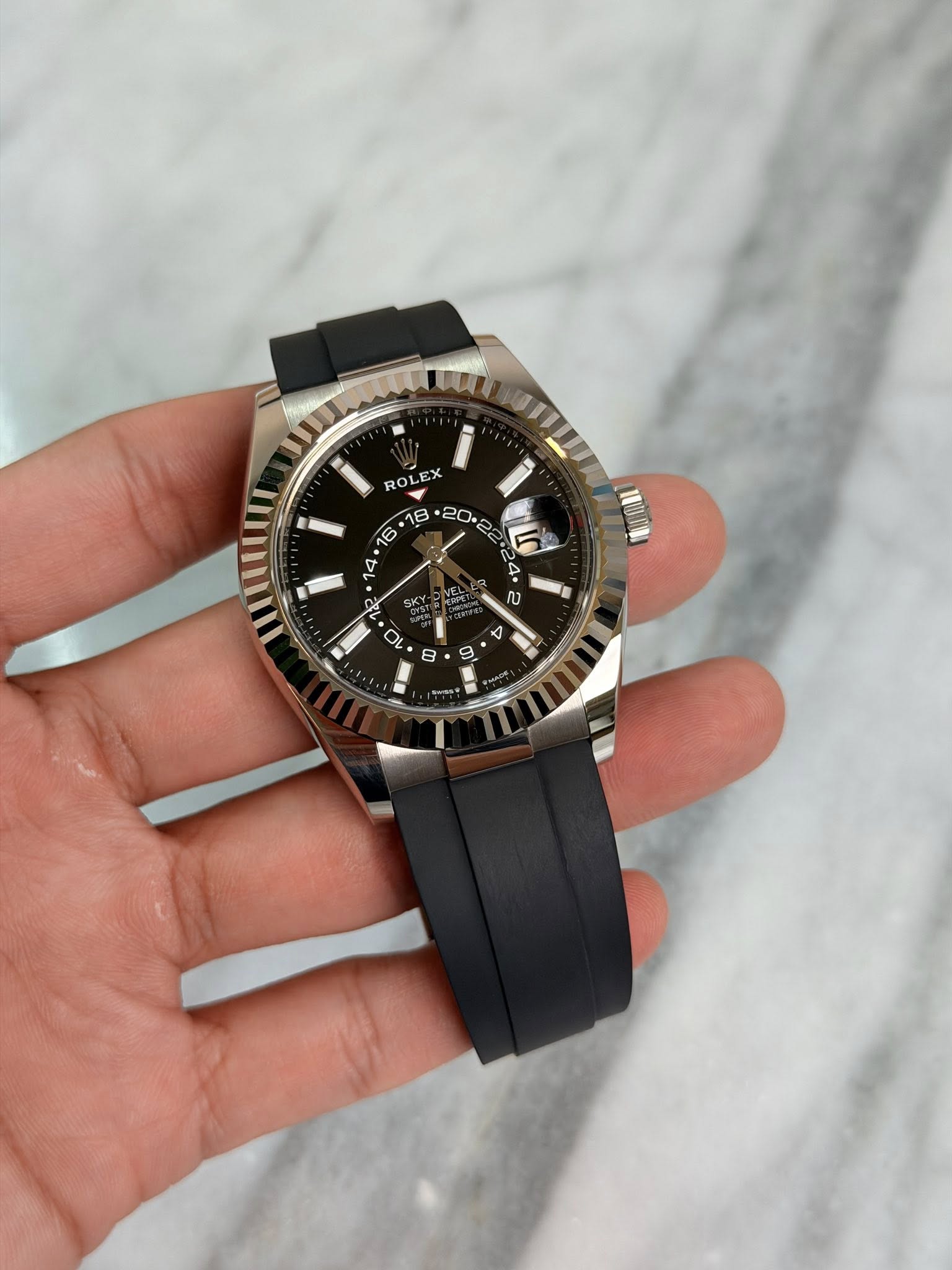 May be an image of wrist watch and text that says 'RO ROLEX ছাত IC 24. လ ME NEL ن O 0 يان 4 - 4 B ت'