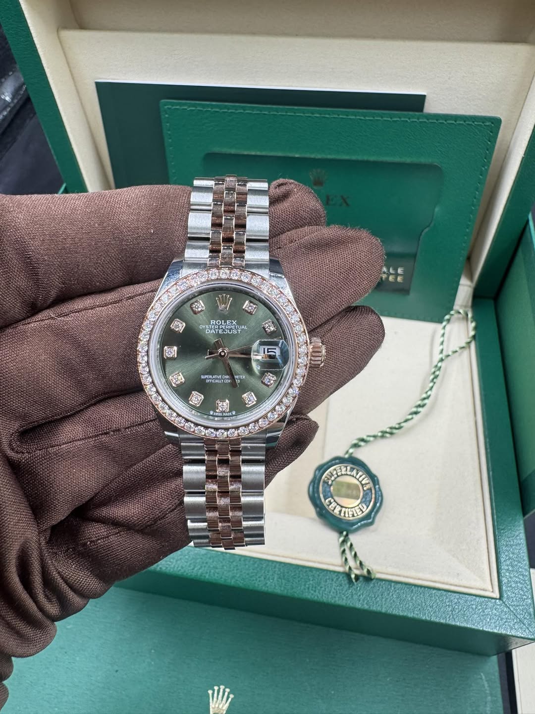 May be an image of wrist watch and text
