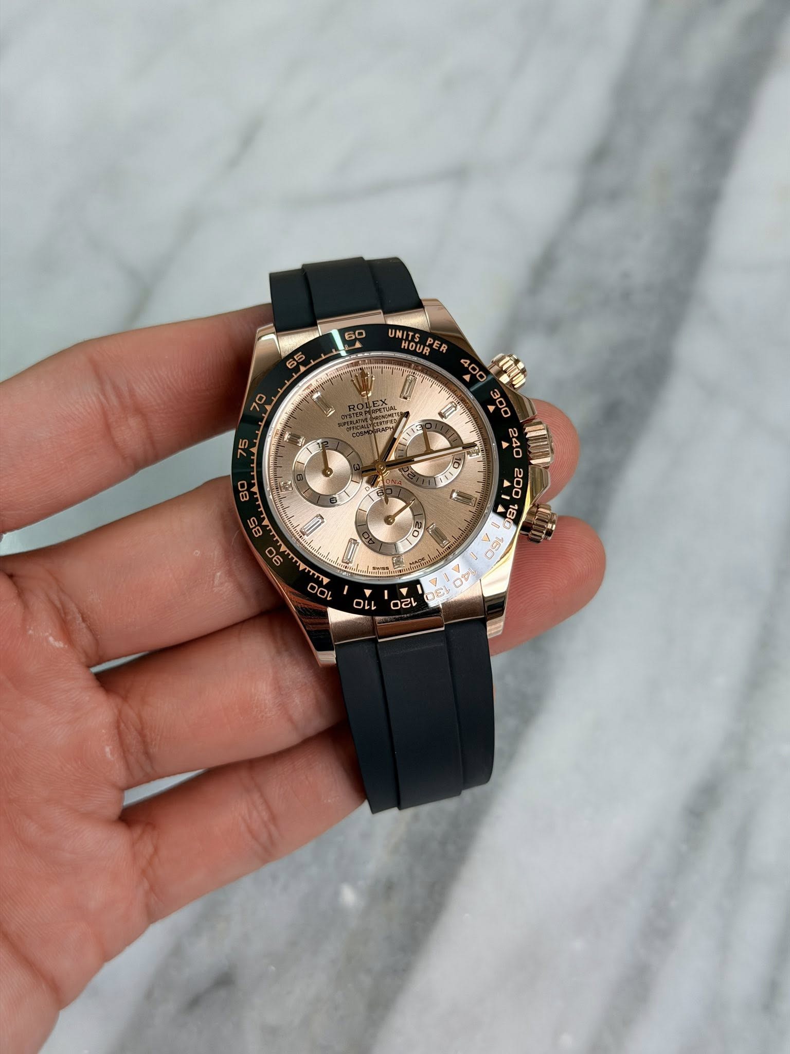 May be an image of wrist watch and text