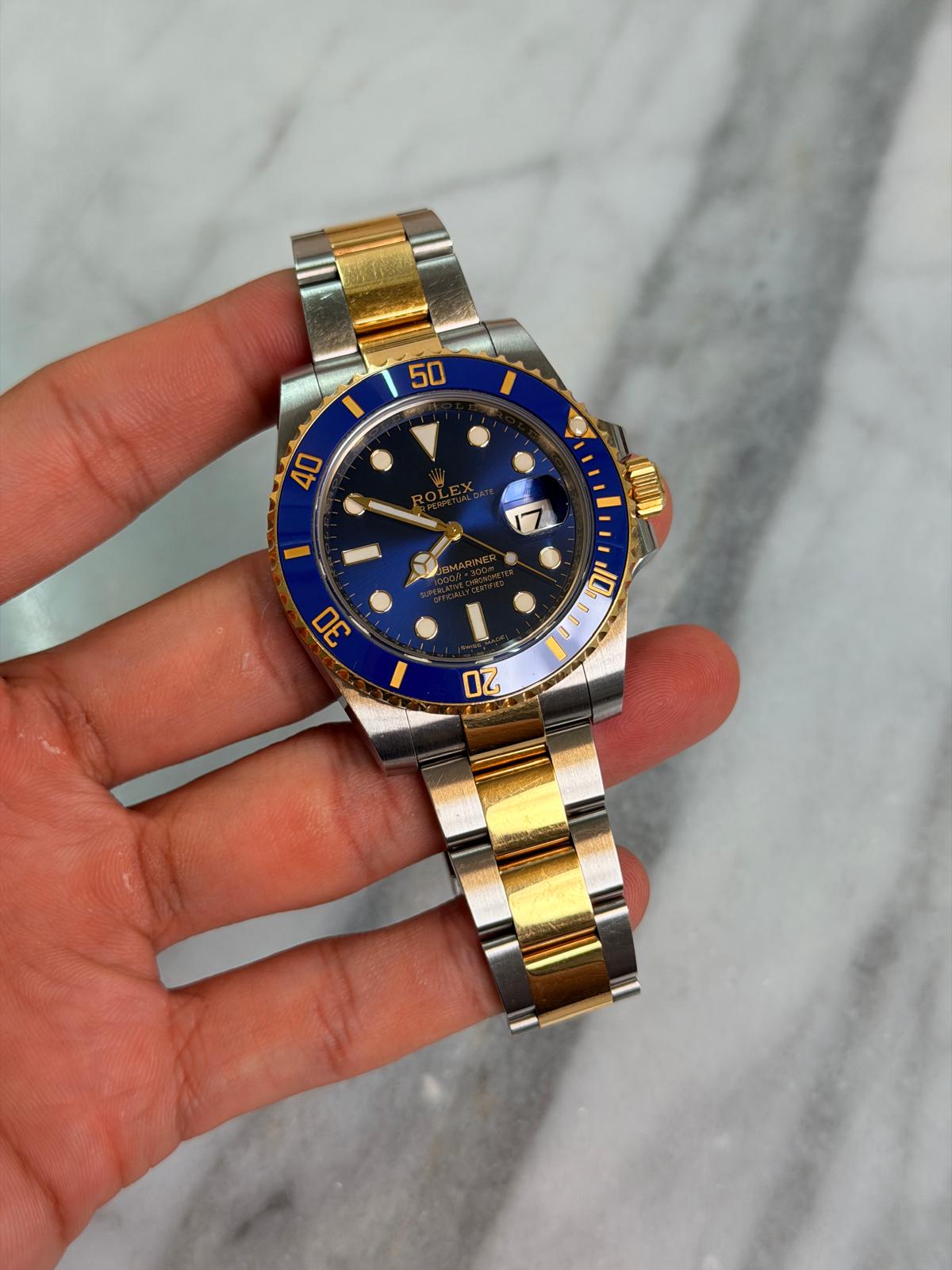 May be an image of wrist watch and text that says '50 40 7 DE 10 I - N'