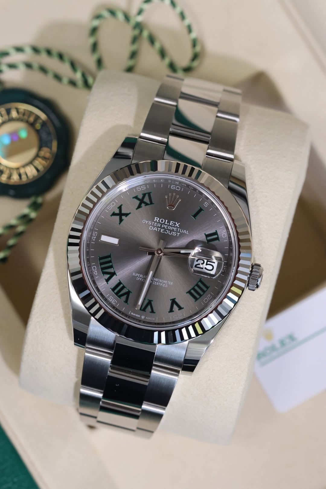 May be an image of wrist watch and text