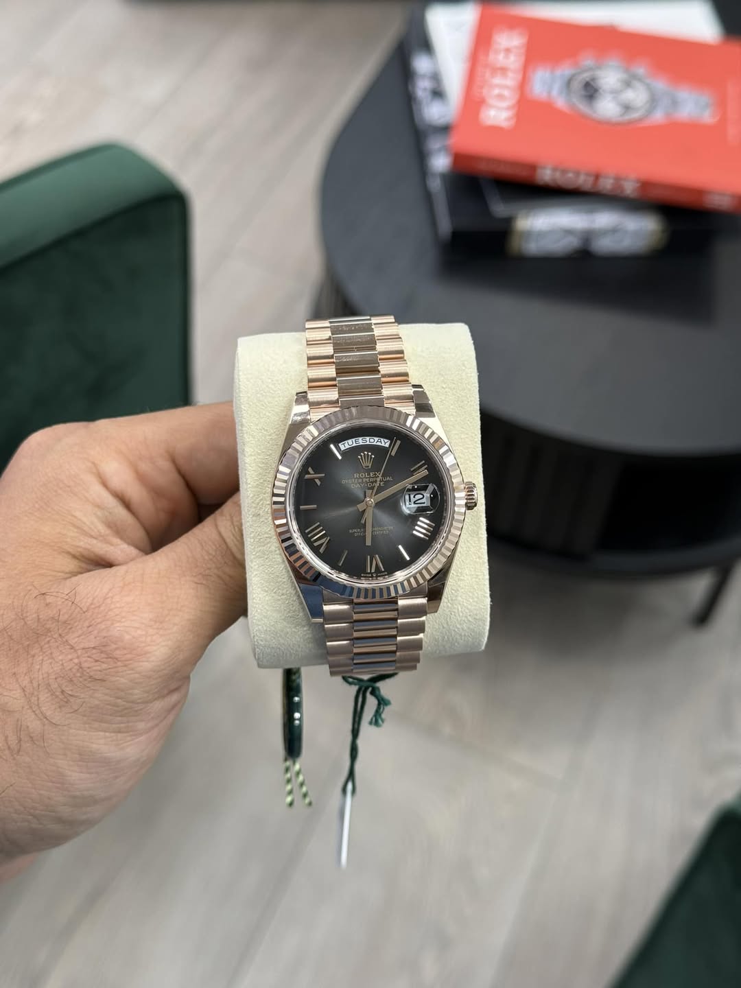 May be an image of wrist watch and text