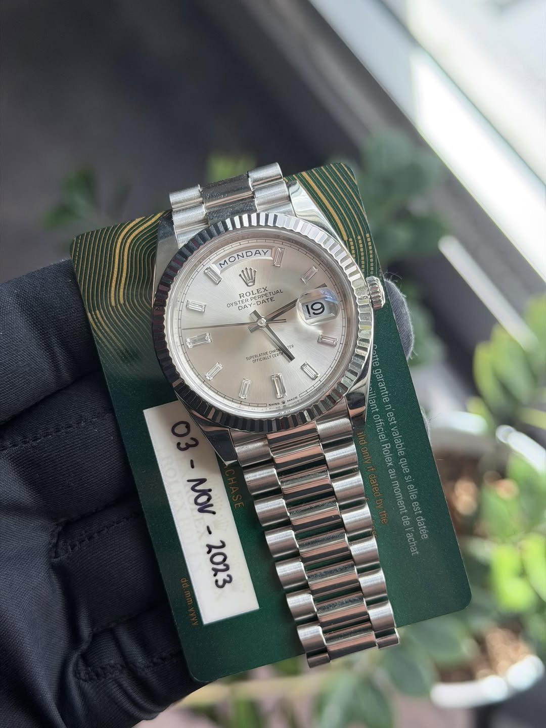 May be an image of wrist watch and text that says 'MONDAY MONDAY L W ROLEX STERPERPRT -AAЛR -DA7を TUAL OYSTER YST CAY-DA STERI 150 製R 19 3 CET . ម្រ a garante officiel est Rolex…