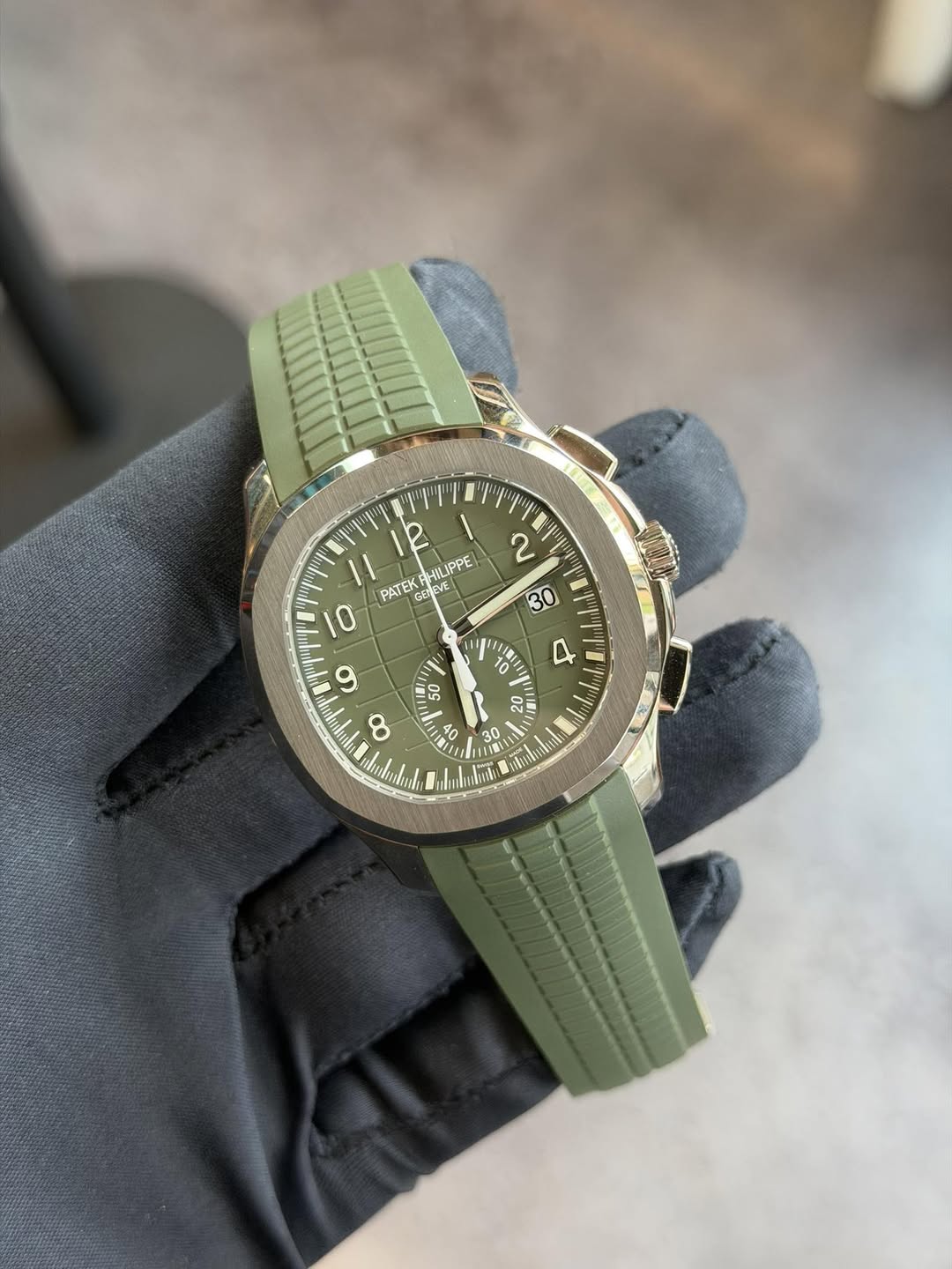 May be an image of wrist watch and text