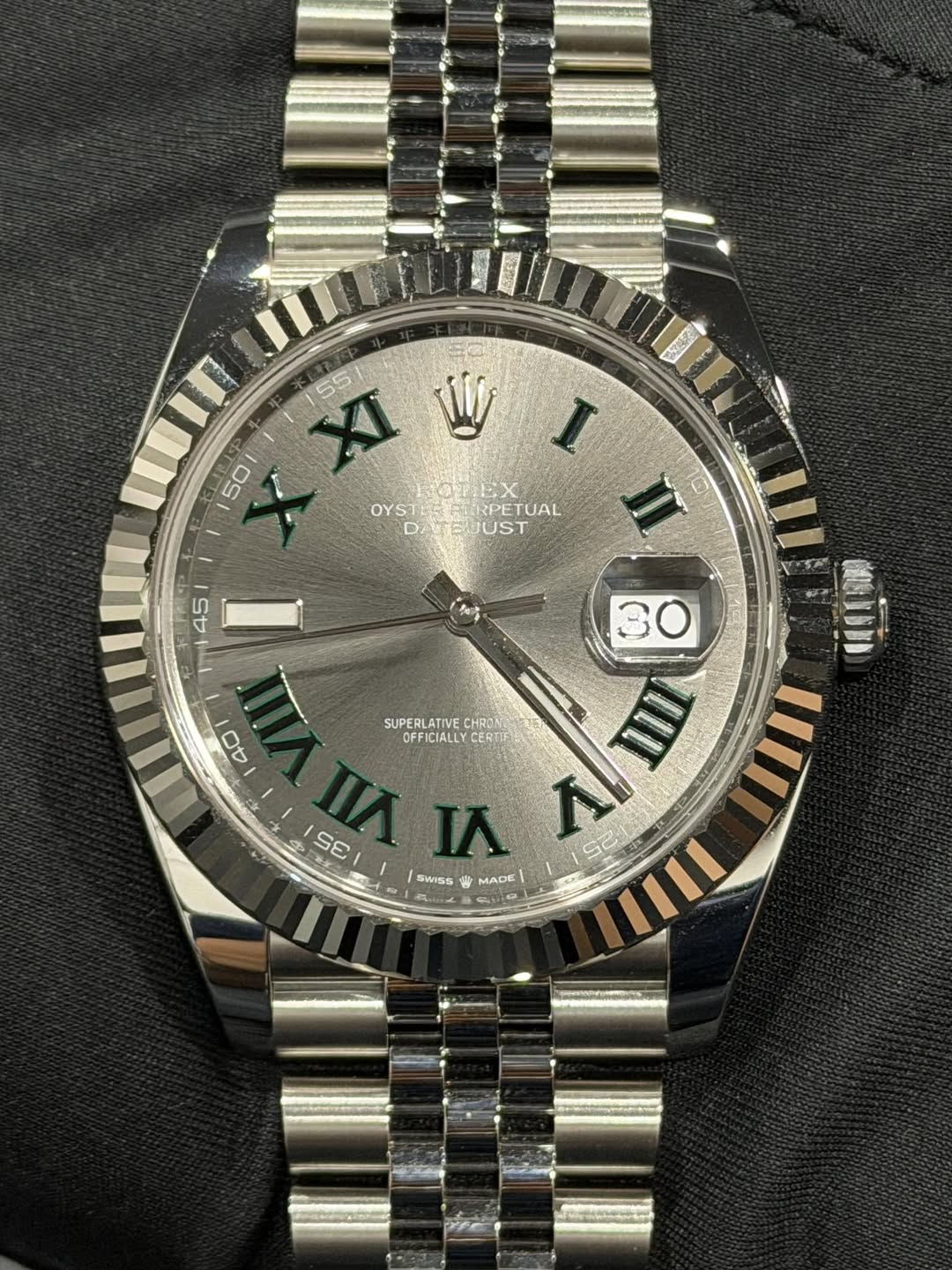 May be an image of wrist watch and text that says '55 W I 50 1 XI FOLEX OYSTERFIRPETUAL OYST ERPETUAL DAMTE DI ATEUJUST JUST 45 W 40 SUPERLATIVE CHRON OFFICIALLY CeфE ЛΙ AAE 30 แม…
