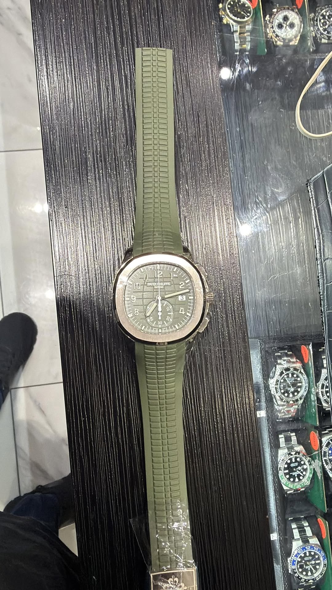 May be an image of digital watch and text
