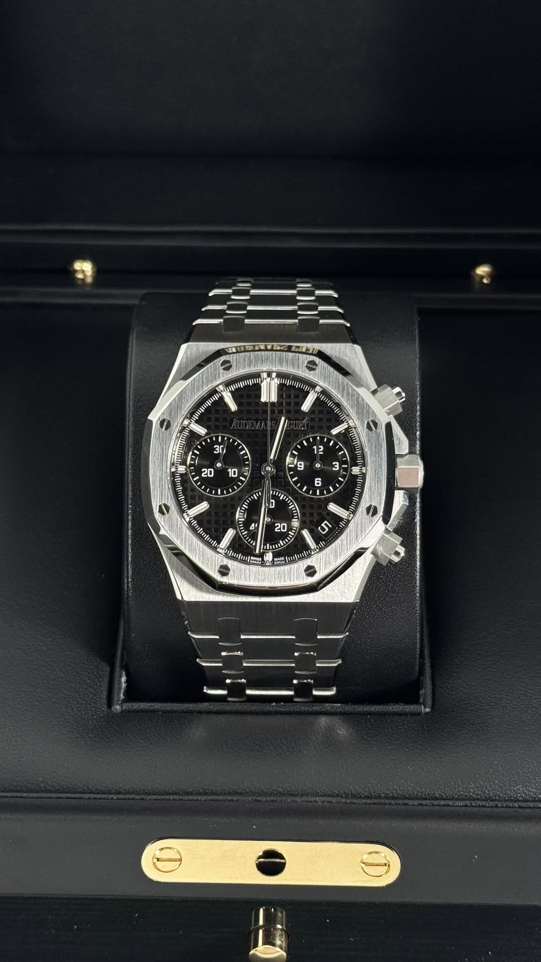 May be an image of wrist watch and text