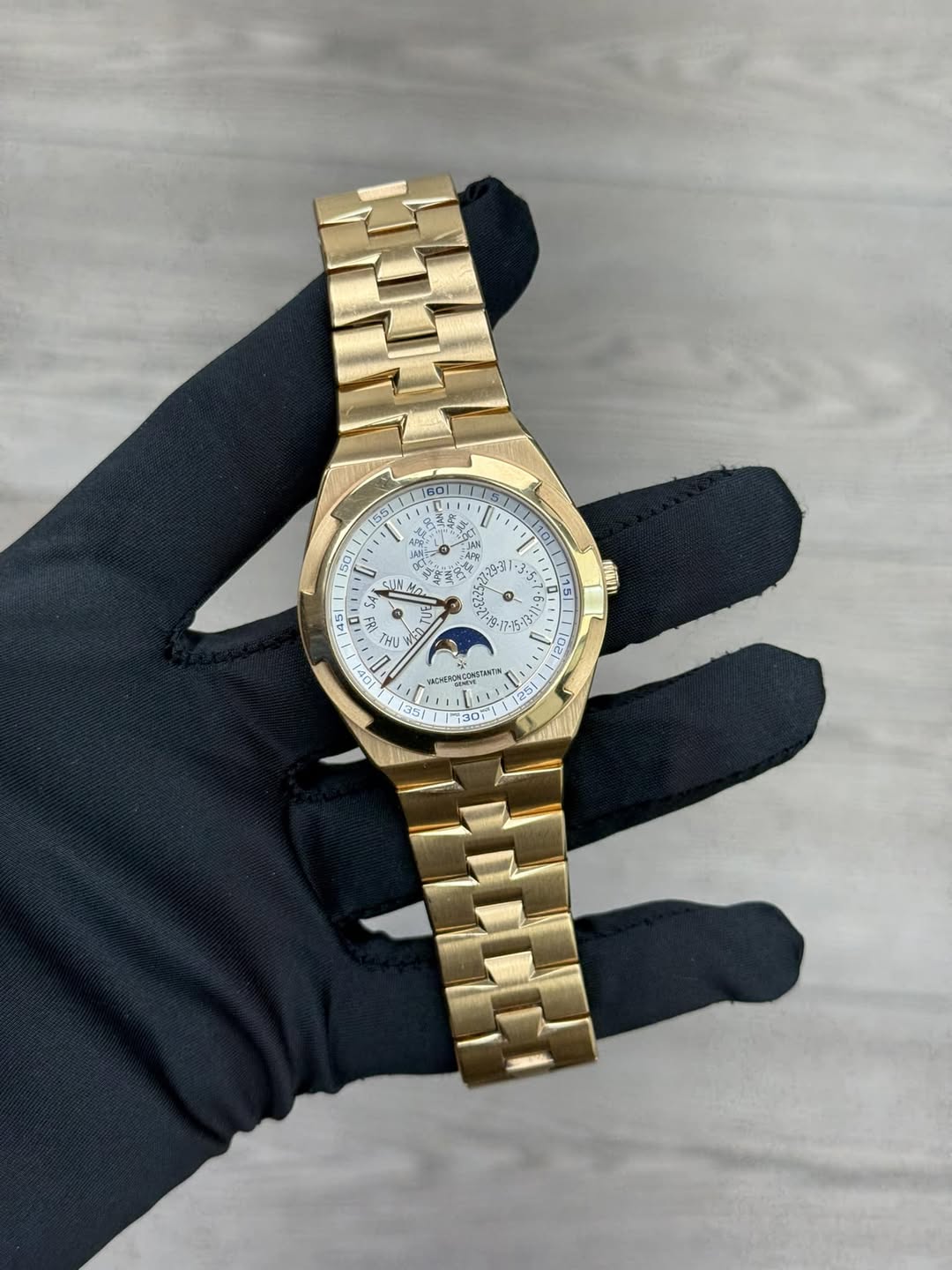 May be an image of wrist watch and text