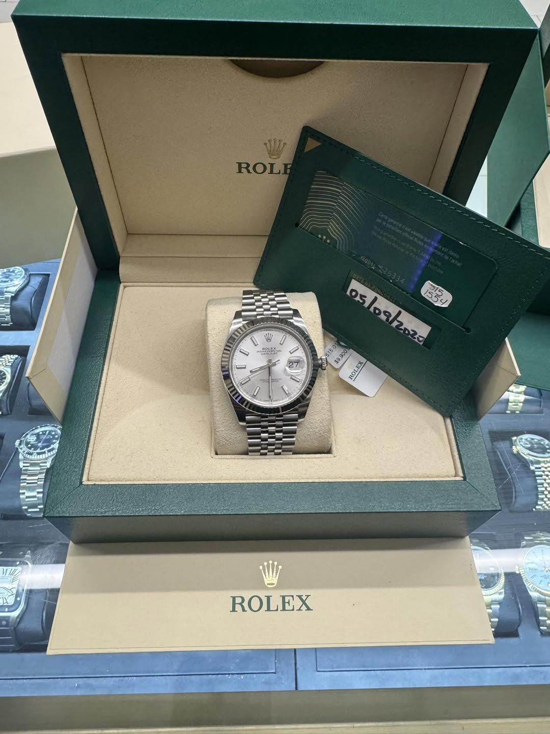 May be an image of wrist watch and text