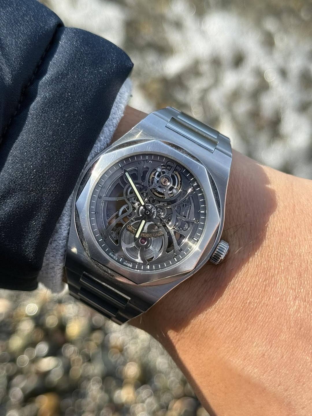 May be an image of wrist watch and text