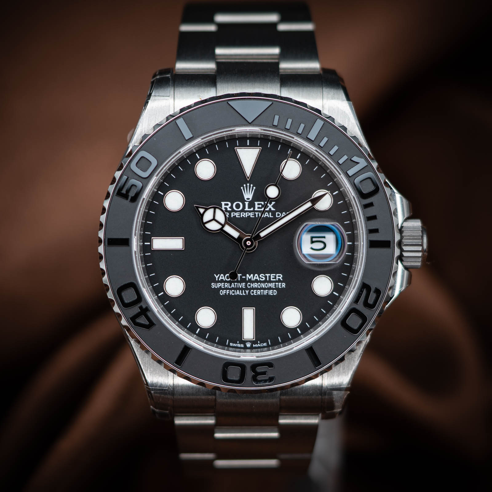 May be an image of wrist watch and text that says '50 ROLEX PERPETIAL DA 5 YAC. -MASTER SUPER YAC.T-MASTER SUPERLA SUPERLATIE CHRONOMETE S TER OFFICIALLY OFFICIALLYCERTIFIED…