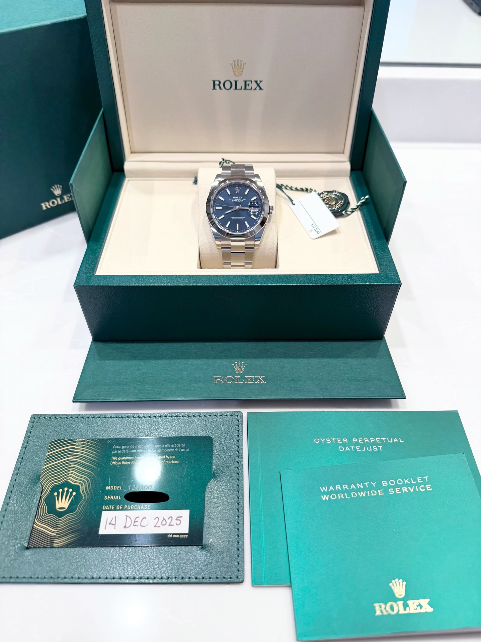 May be an image of wrist watch and text that says 'ROLEX ROLE 間 ॐ ROLLA ROL C PApOA racat ลนารนอ 26300 OYSTER OYSTERPERPETUAL PERPETUAL DATEJUST MODEL SERIAL DATE PURCHASE 14…