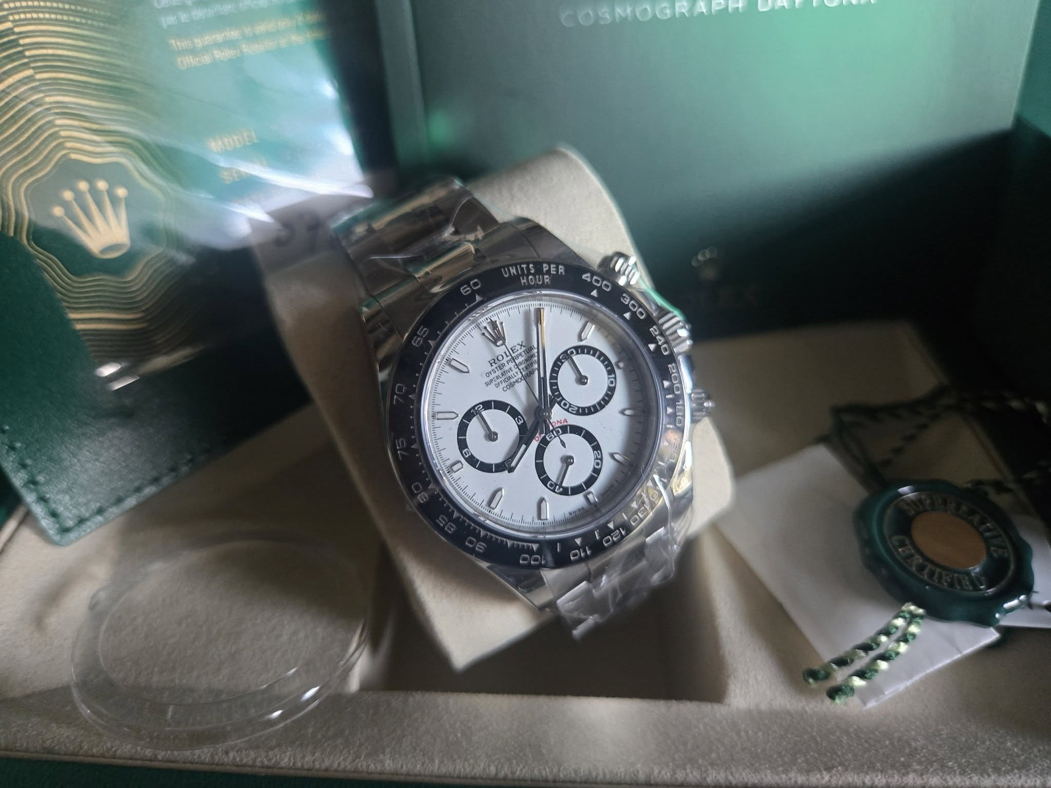 May be an image of wrist watch and text