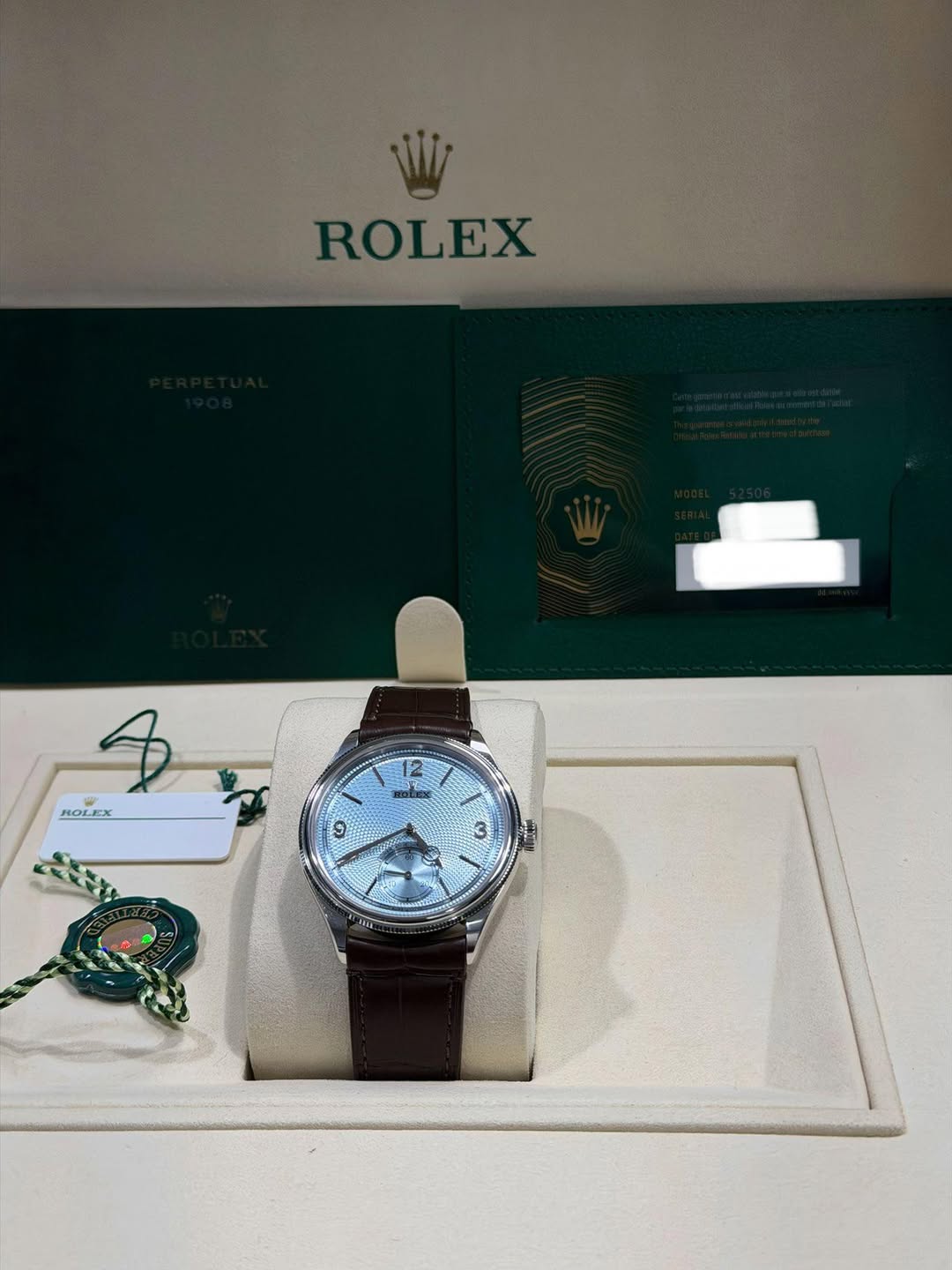 May be an image of wrist watch and text