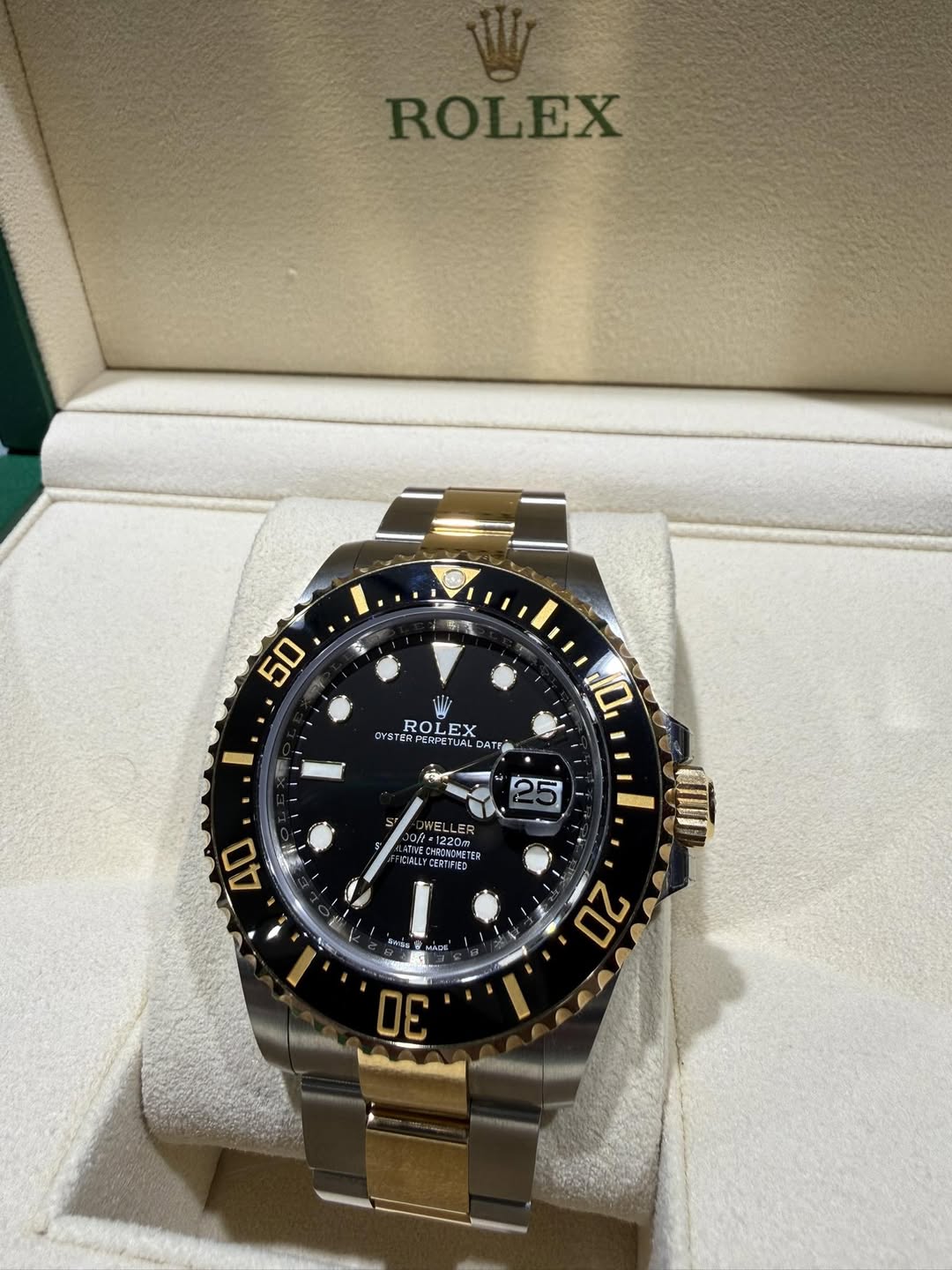May be an image of wrist watch and text