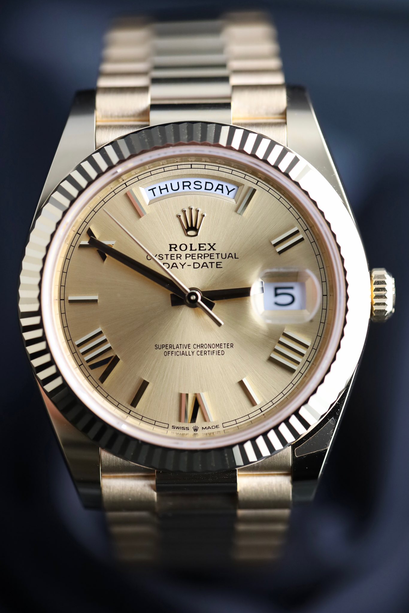 May be an image of wrist watch and text that says 'THURSDAY THURSDAY II ROLEX STER PERPET PERPETUAL TUAL DAY-DATE DA DATE 5 SUPERLATIVE SUPERLATIVECHRONOMETER TIVE CHRONOMET TER…