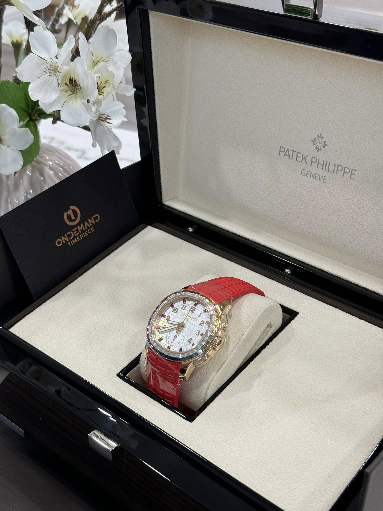 May be an image of wrist watch and text