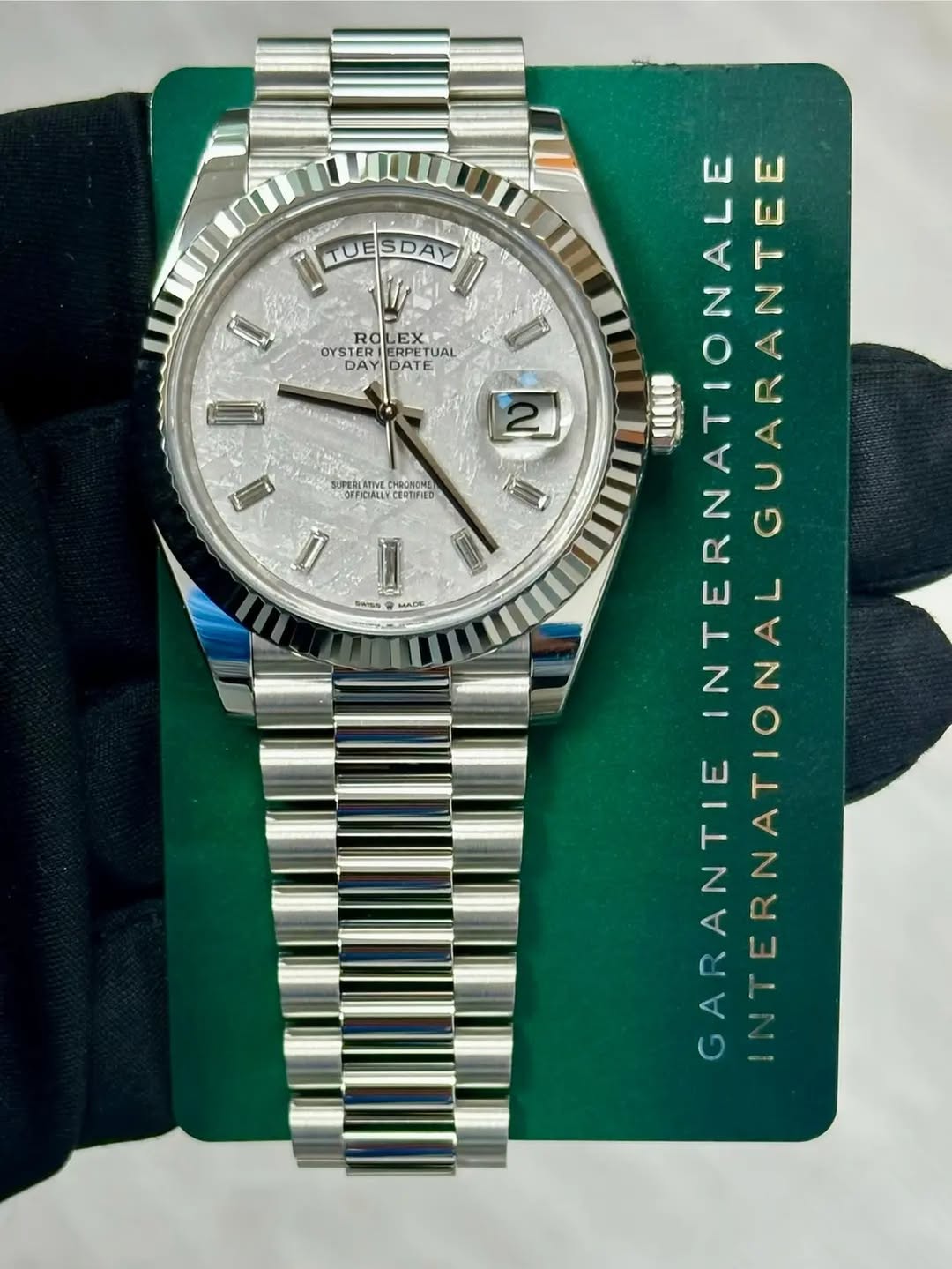 May be an image of wrist watch and text that says 'TUE SDAY RO EX OYSTERI RPETUAL UAL DAY DATE DAYIDATE II SUPERCRTVE HBoлomc FICIALLY 1 Sws MADE ณ 110 INTERNATION NATIONALE…