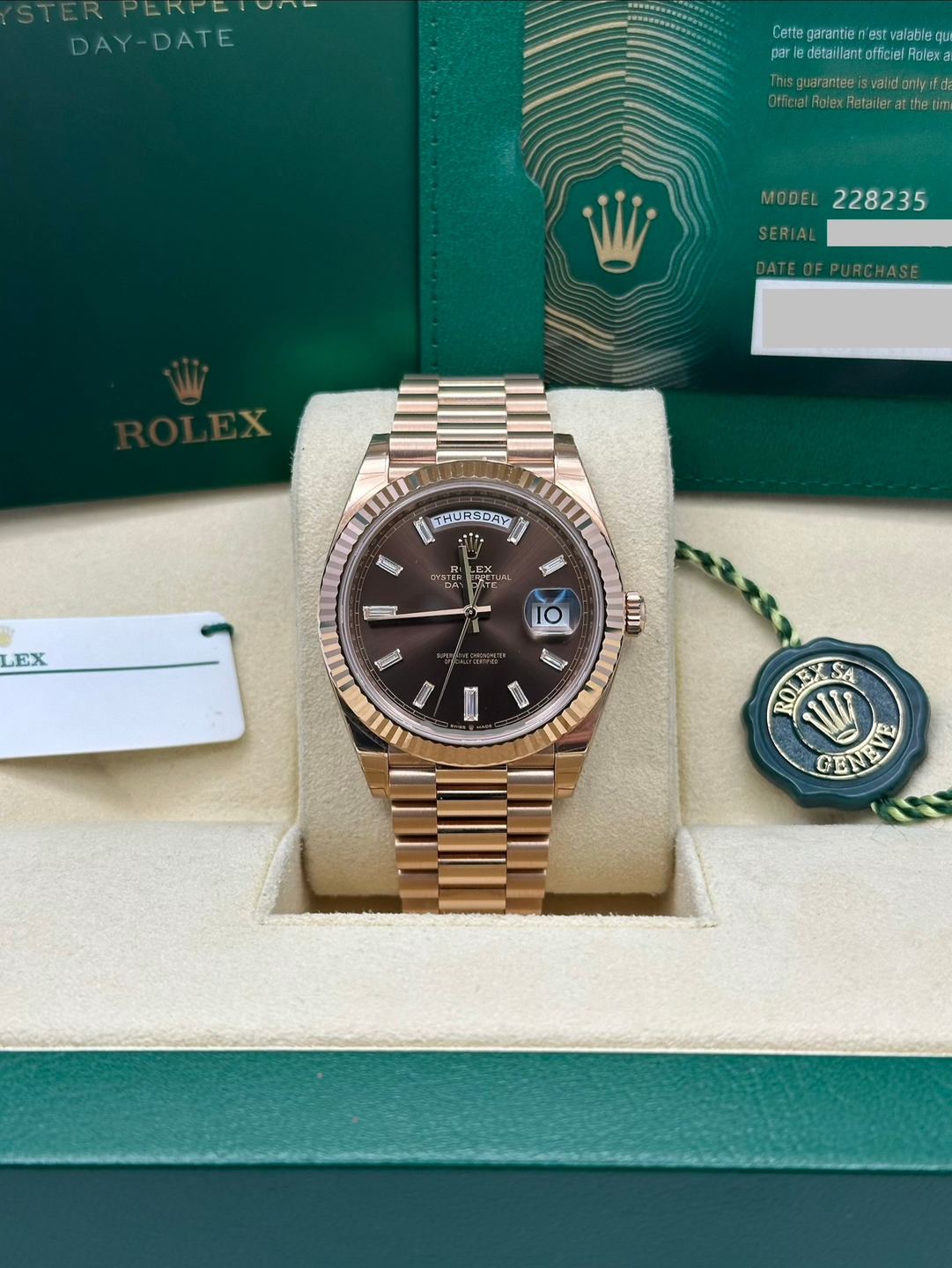 May be an image of wrist watch and text