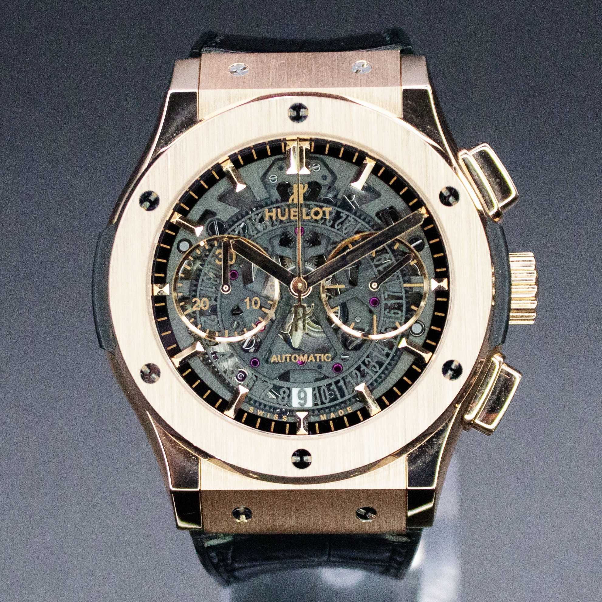 May be an image of wrist watch and text that says 'o Θ AR HUELOT ELOT 参茶 e O 20 10 ၁ 0 AUT AUTOMATIC 9051 A 9 0SEL'
