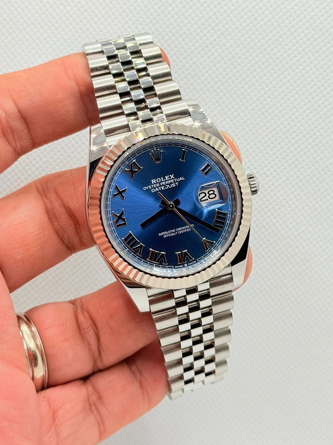 May be an image of wrist watch and text that says 'Ko UAL OYS DATEJUST ROLETUAL DATE DAT ATEJUST STERPERP ROL ROLEX STERPE ERPERPETUA ERPETUAL ERPET JUST ERPENIST こんに 733-33!4 28…