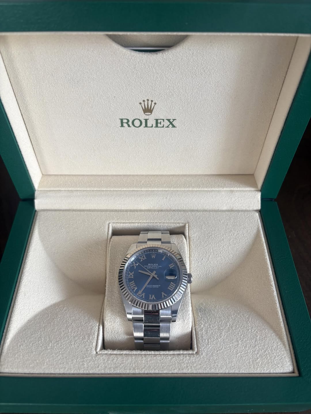 May be an image of wrist watch and text that says 'WI ROLEX'