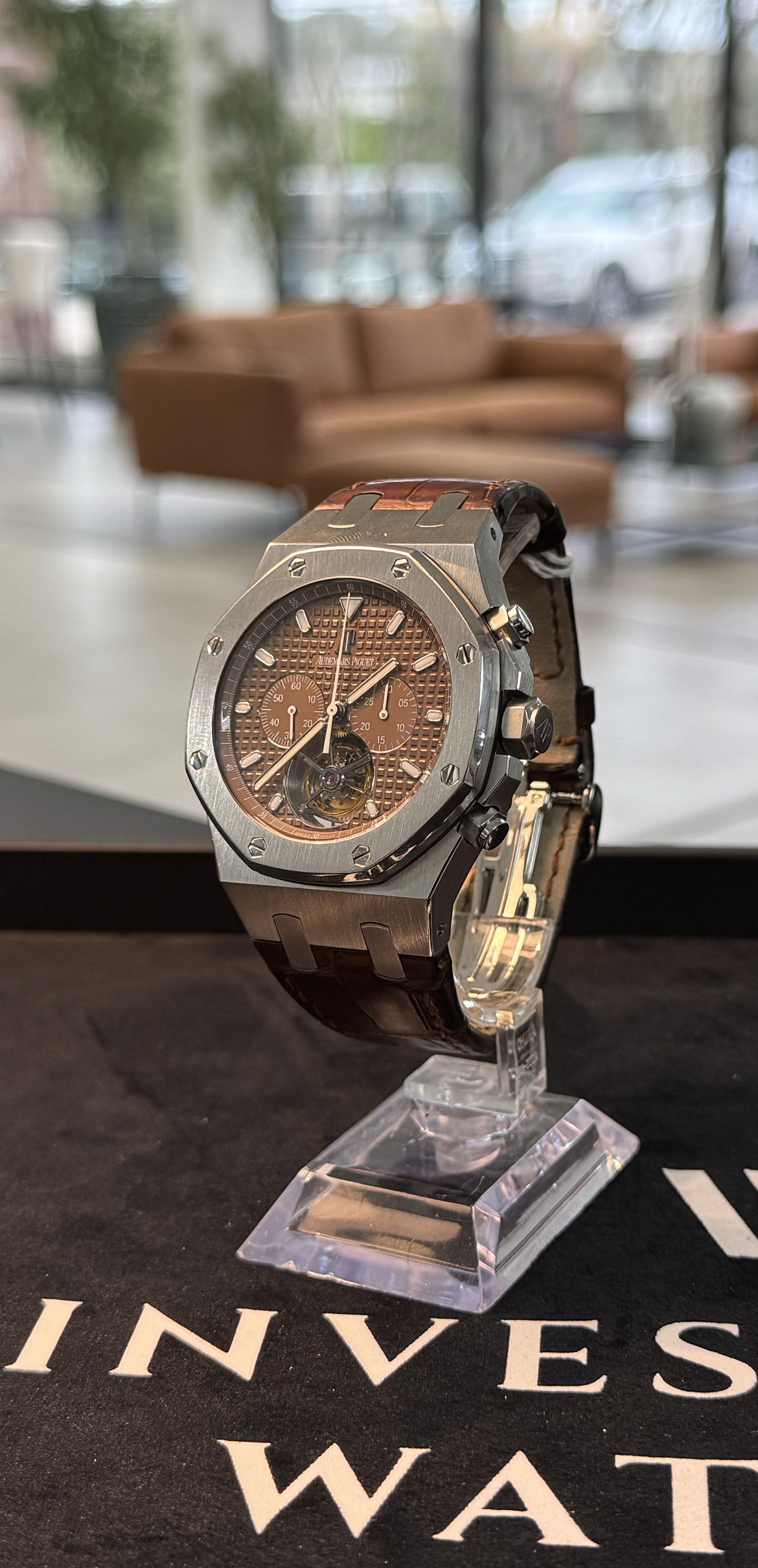 May be an image of wrist watch and text that says '· 番 INVES IN Μ WAT'